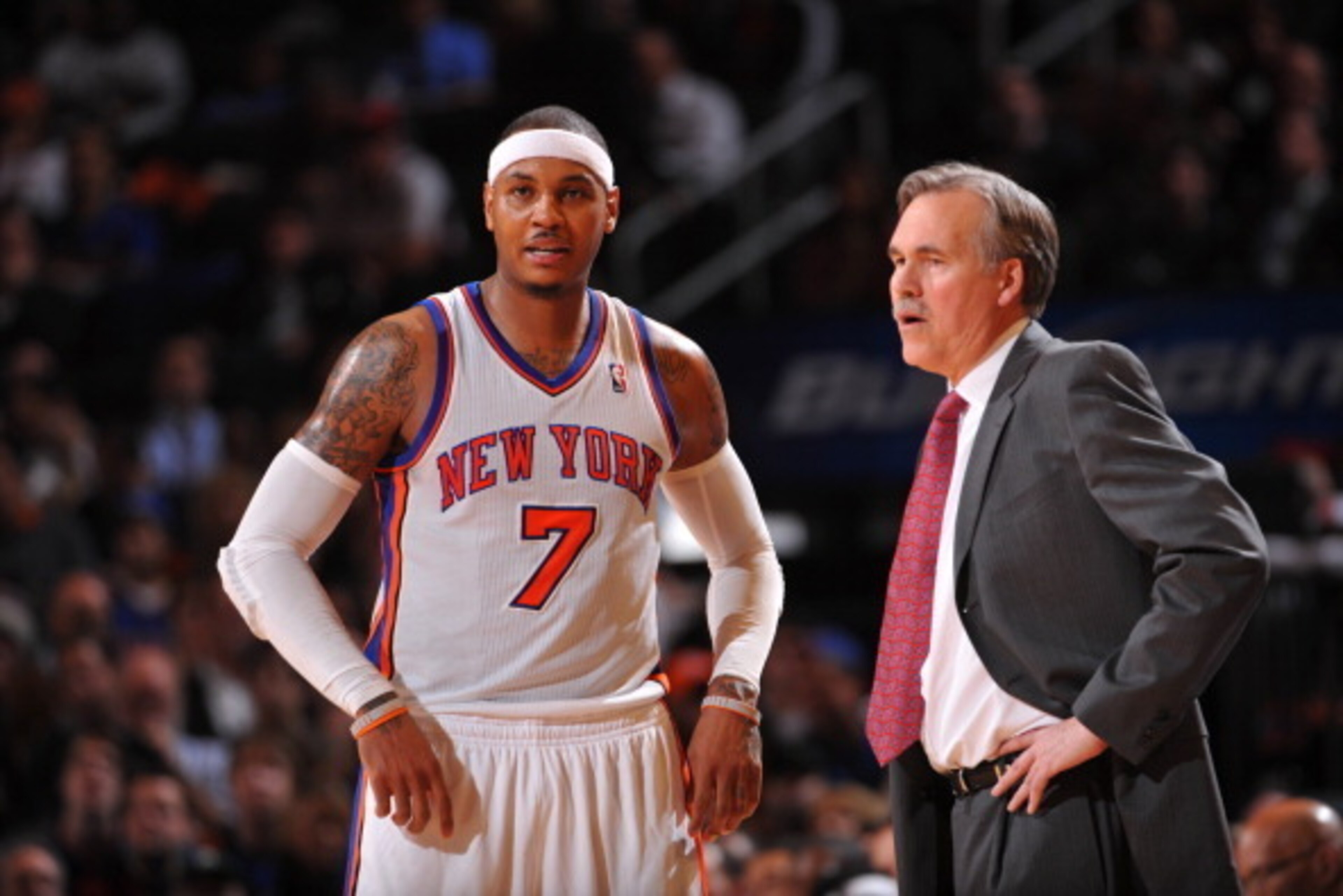 NEW YORK - JANUARY 11: Carmelo Anthony #7 of the New York Knicks talks to head coach Mike D'Antoni during the game against the Philadelphia 76ers on January 11, 2012 at Madison Square Garden in New York, New York.  NOTE TO USER: User expressly acknowledge