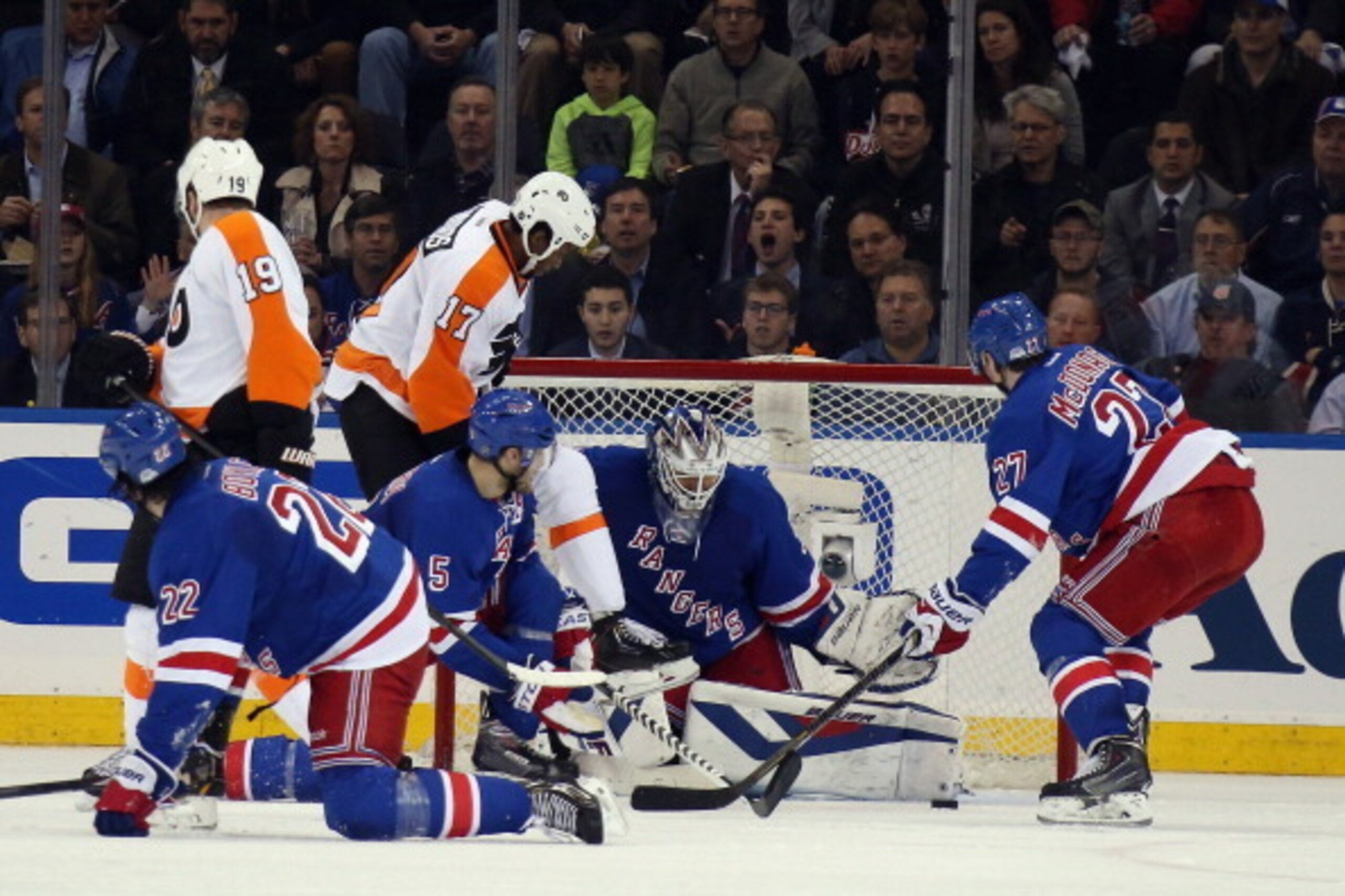 NEW YORK, NY - APRIL 30: The New York Rangers defend the net against the Philadelphia Flyers in Game Seven of the First Round of the 2014 NHL Stanley Cup Playoffs at Madison Square Garden on April 30, 2014 in New York City. The Rangers defeated the Flyers