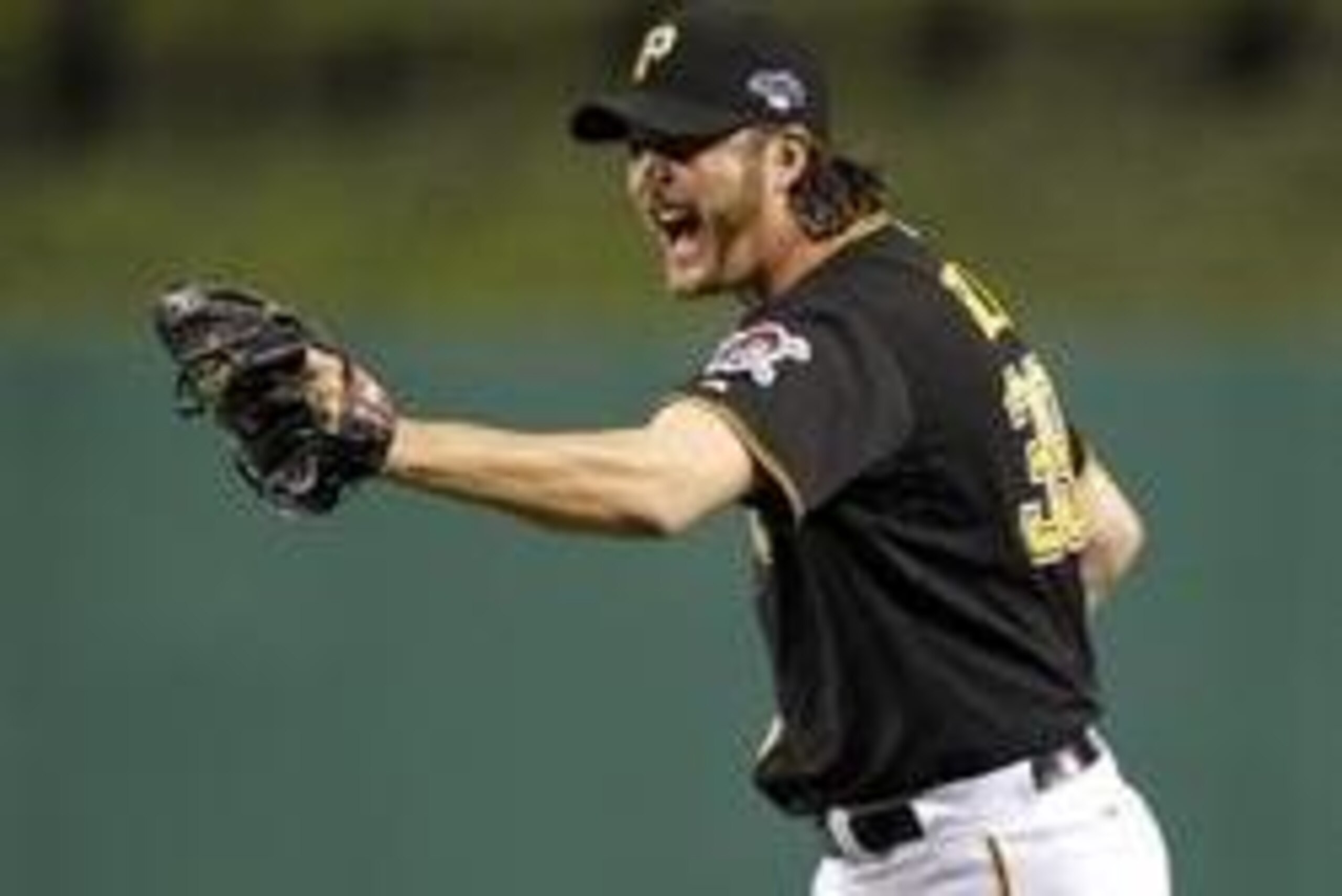Oct 6, 2013; Pittsburgh, PA, USA; Pittsburgh Pirates relief pitcher Jason Grilli (39) celebrates after game three of the National League divisional series playoff baseball game against the St. Louis Cardinals at PNC Park. Mandatory Credit: Charles LeClair