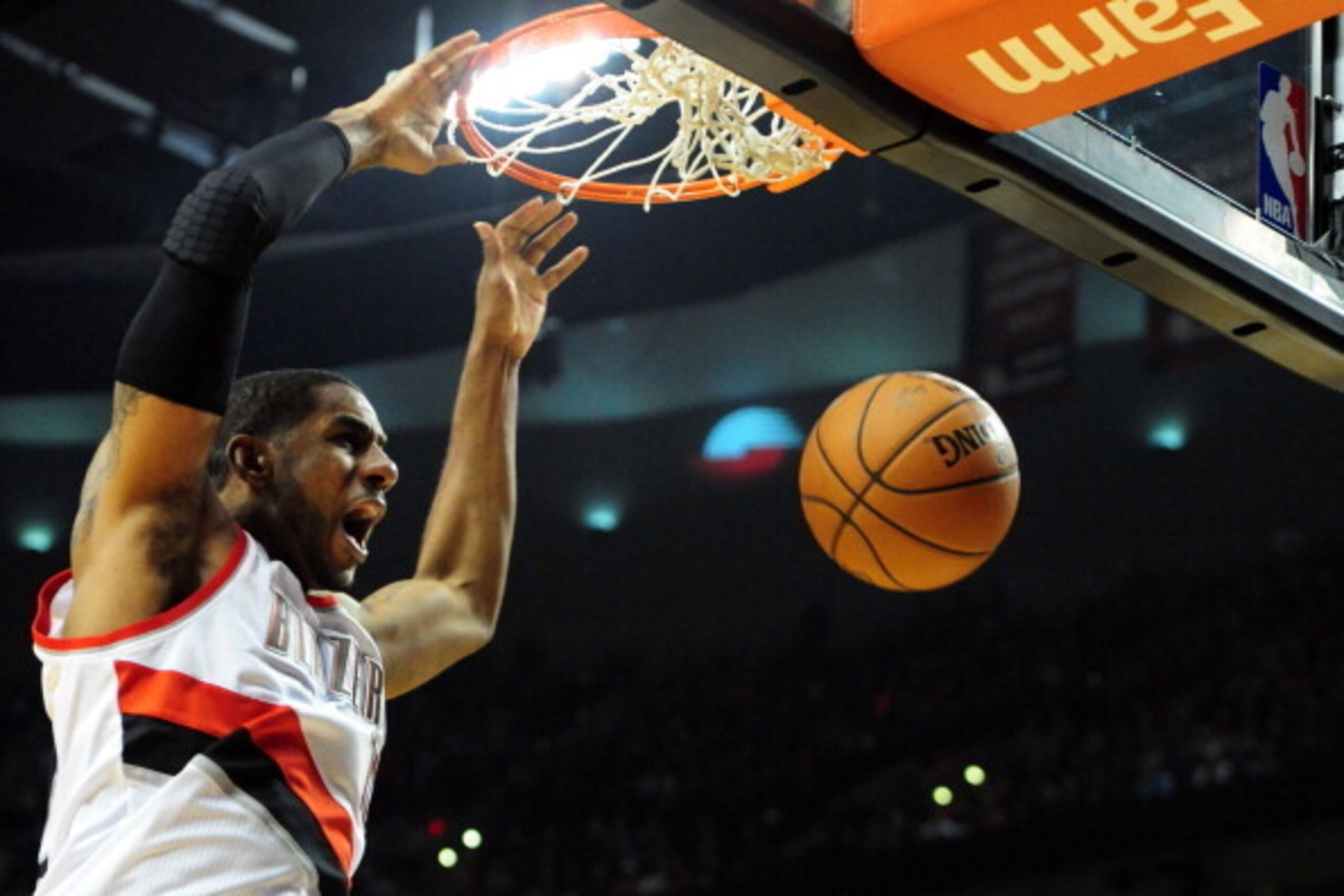 PORTLAND, OR - APRIL  27: LaMarcus Aldridge #12 of the Portland Trail Blazers dunks the ball in the second half of Game Four of the Western Conference Quarterfinals against the Houston Rockets during the 2014 NBA Playoffs at the Moda Center on April 27, 2