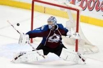 Apr 30, 2014; Denver, CO, USA; Colorado Avalanche goalie Semyon Varlamov (1) deflects away a shot against the Minnesota Wild in the second period in game seven of the first round of the 2014 Stanley Cup Playoffs at Pepsi Center. Mandatory Credit: Ron Chen