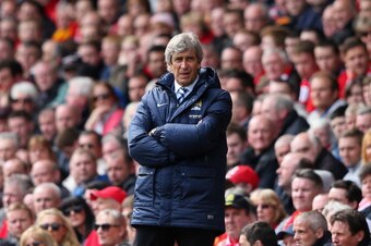 LIVERPOOL, ENGLAND - APRIL 13:  Manchester City Manager Manuel Pellegrini looks on during the Barclays Premier League match between Liverpool and Manchester City at Anfield on April 13, 2014 in Liverpool, England.  (Photo by Alex Livesey/Getty Images)