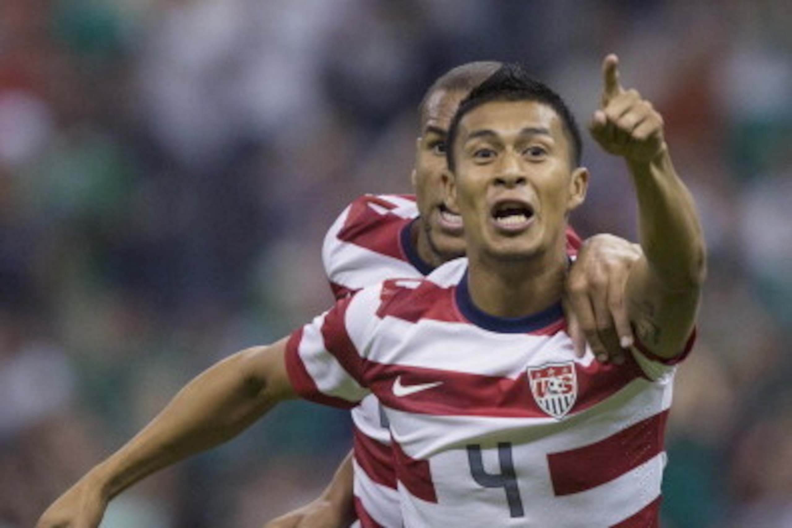 MEXICO CITY, MEXICO - AUGUST 15:  Michael Orozco of the United States celebrates after scoring during a FIFA friendly match between Mexico and US at Azteca Stadium on August 15, 2012 in Mexico City, Mexico. (Photo by Miguel Tovar/Getty Images)