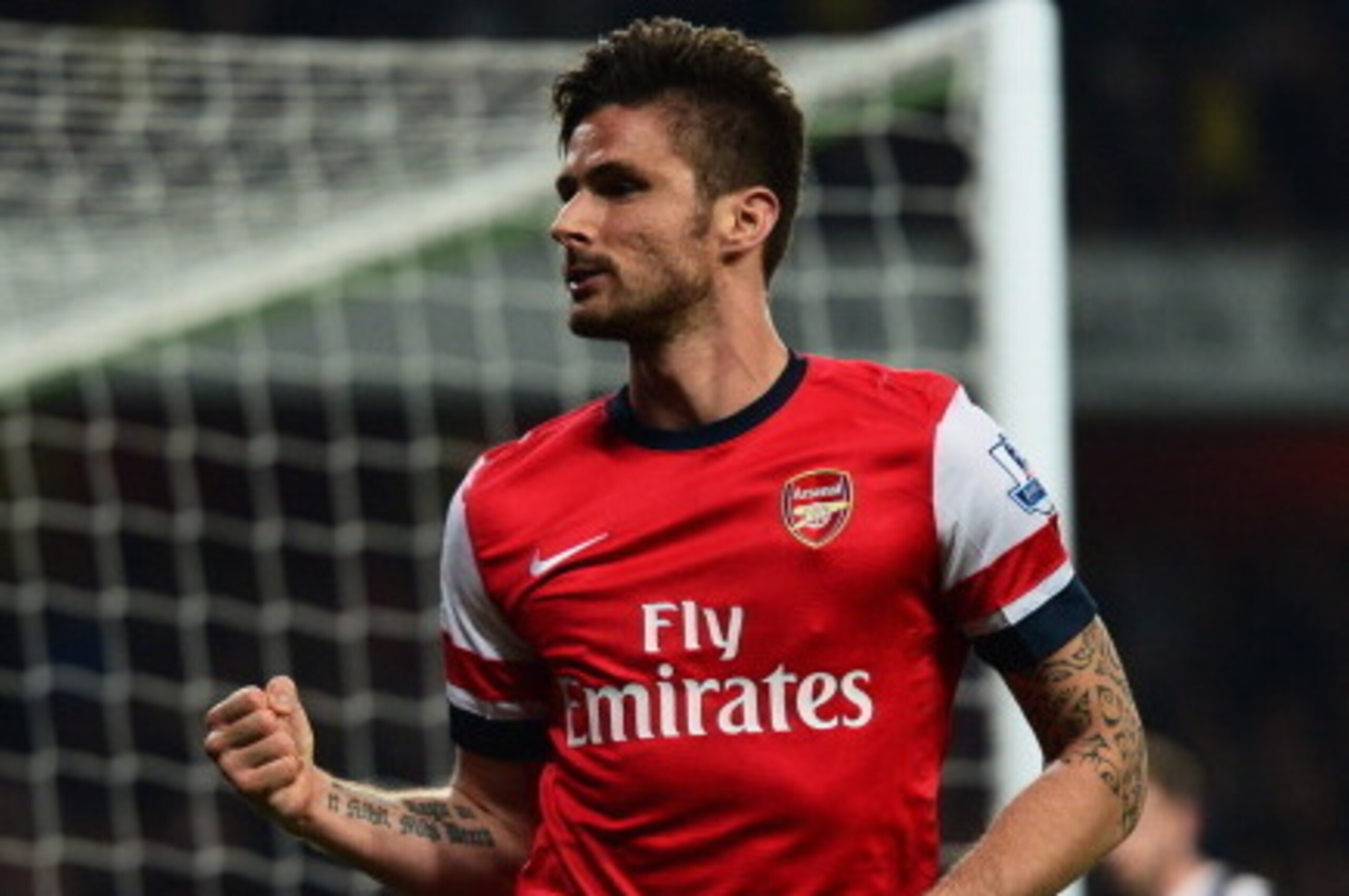 LONDON, ENGLAND - APRIL 28:  Olivier Giroud of Arsenal celebrates as he scores their third goal during the Barclays Premier League match between Arsenal and Newcastle United at Emirates Stadium on April 28, 2014 in London, England.  (Photo by Jamie McDona