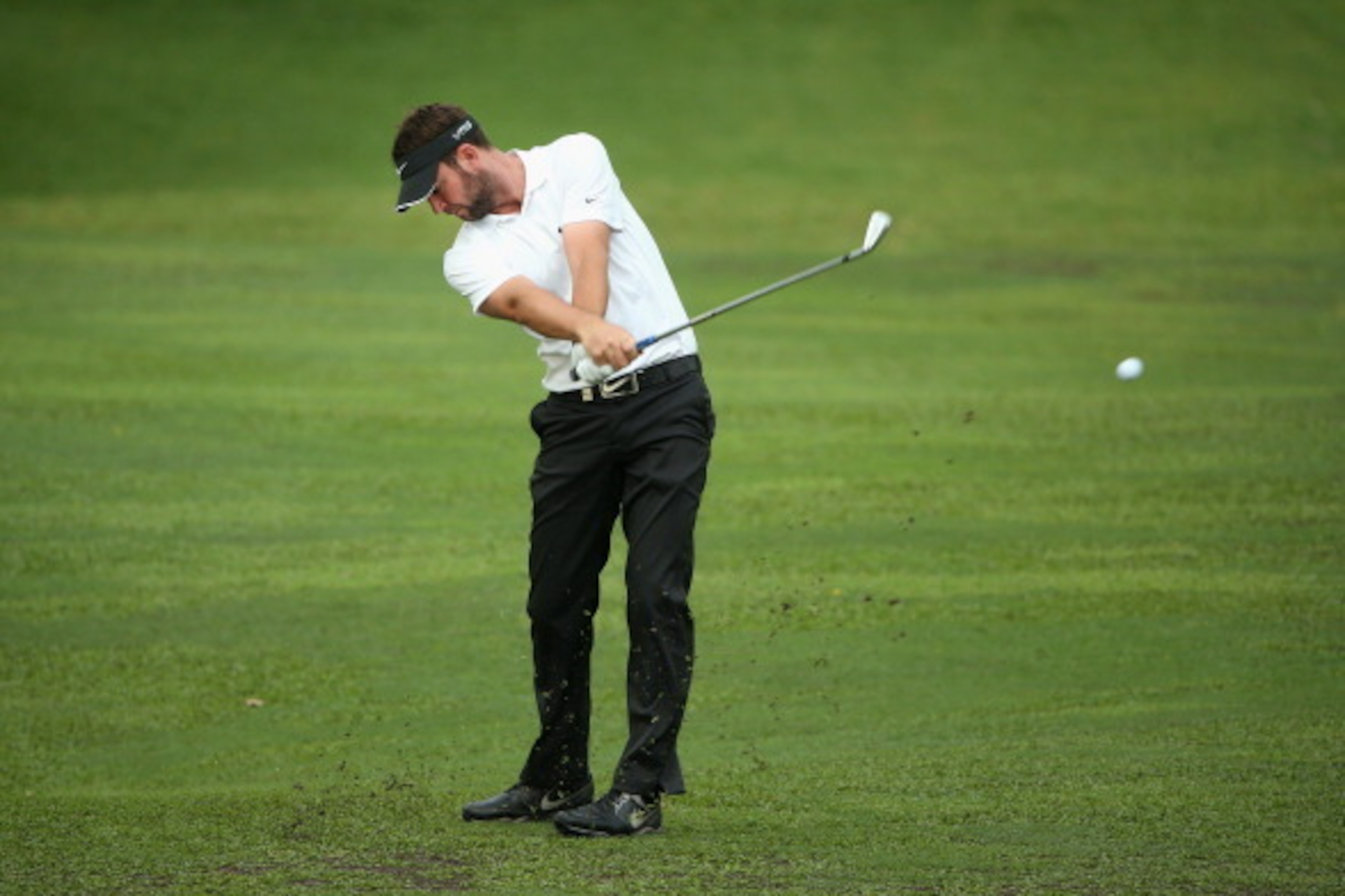 SINGAPORE - MAY 01:  Scott Jamieson of Scotland in action on day one of The Championship at Laguna National held at Laguna National Golf & Country Club on April 30, 2014 in Singapore.  (Photo by Andrew Redington/Getty Images)