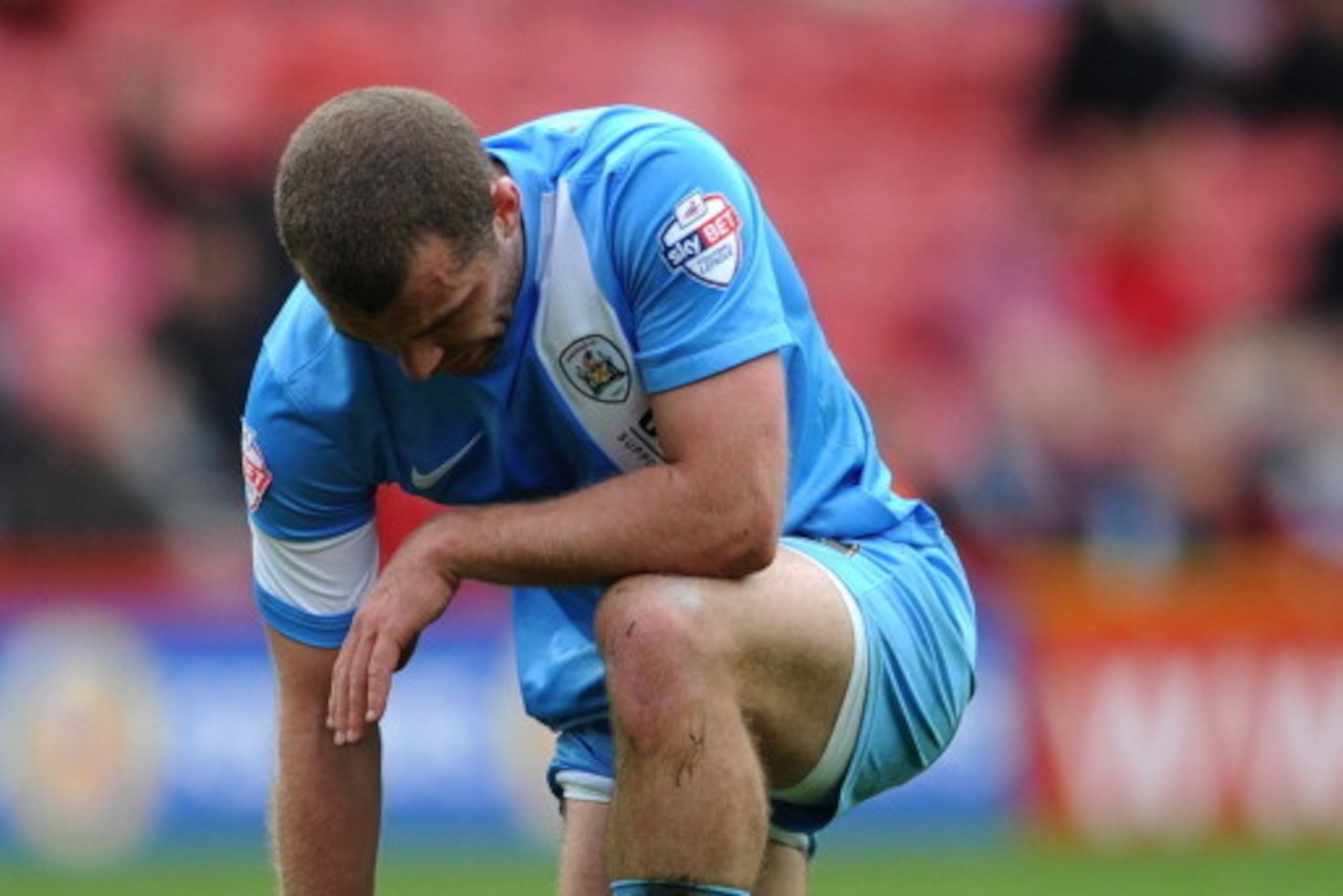 MIDDLESBROUGH, ENGLAND - APRIL 26: Stephen Dawson of Barnsley looks dejected during the Sky Bet Championship match between Middlesbrough and Barnsley at the Riverside Stadium on April 26, 2014 in Middlesbrough, England. (Photo by Chris Brunskill/Getty Ima