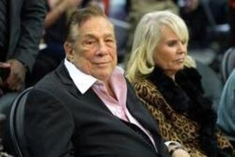 Nov 13, 2013; Los Angeles, CA, USA; Los Angeles Clippers owner Donald Sterling (left) and wife Shelly Sterling attend the game against the Oklahoma City Thunder at Staples Center. The Clippers defeated the Thunder 111-103. Mandatory Credit: Kirby Lee-USA