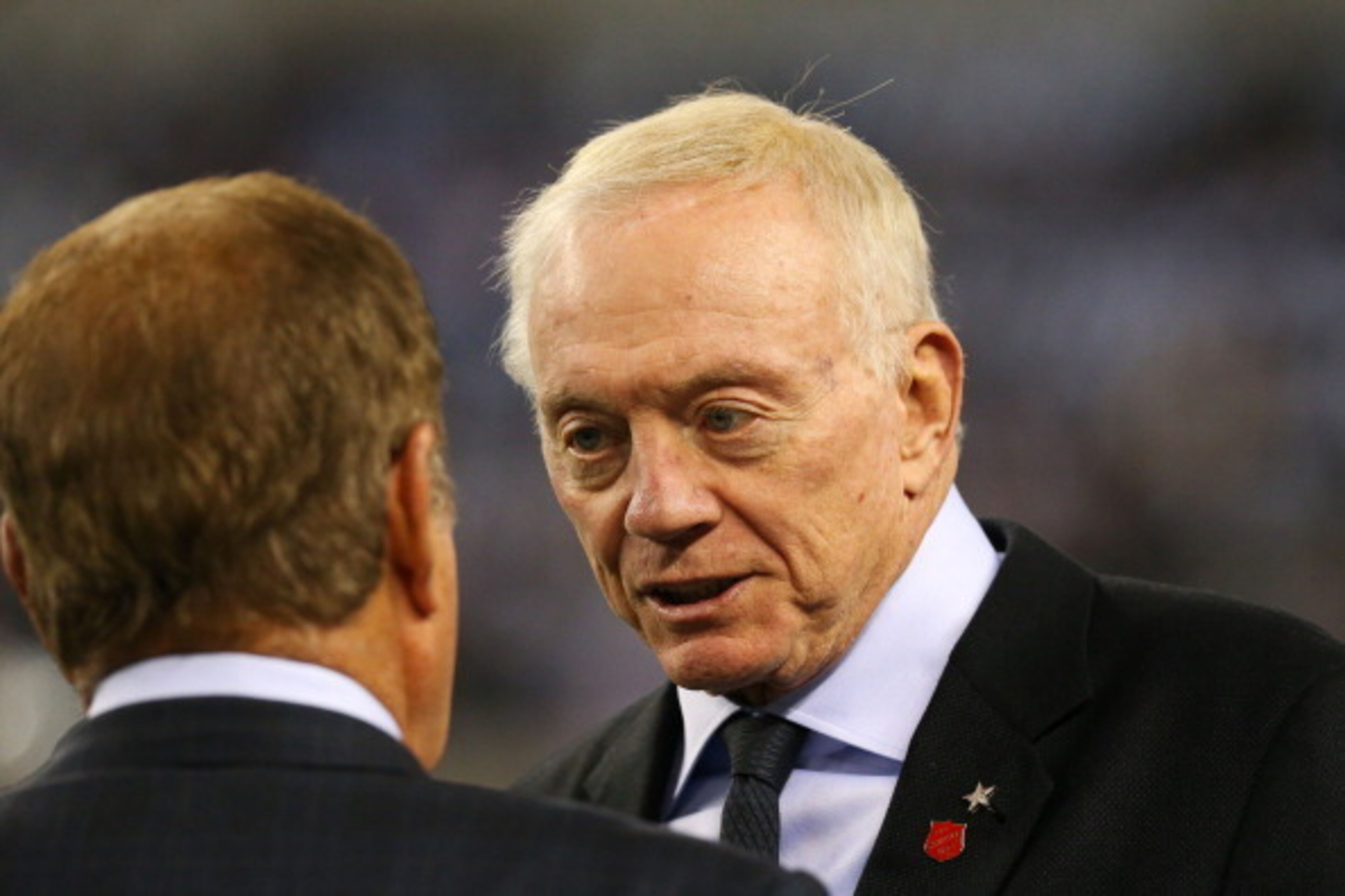 ARLINGTON, TX - DECEMBER 29:  Owner Jerry Jones (R) of the Dallas Cowboys talks to  NBC sportscaster Al Michaels prior to the game between the Dallas Cowboys and the Philadelphia Eagles at Cowboys Stadium on December 29, 2013 in Arlington, Texas.  (Photo 