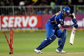 DURBAN, SOUTH AFRICA - OCTOBER 22:  Sachin Tendulkar of Mumbai is bowled during the Champions League twenty20 match between Sydney Sixers and Mumbai Indians at Sahara Stadium Kingsmead on October 22, 2012 in Durban, South Africa. (Photo by Anesh Debiky / 