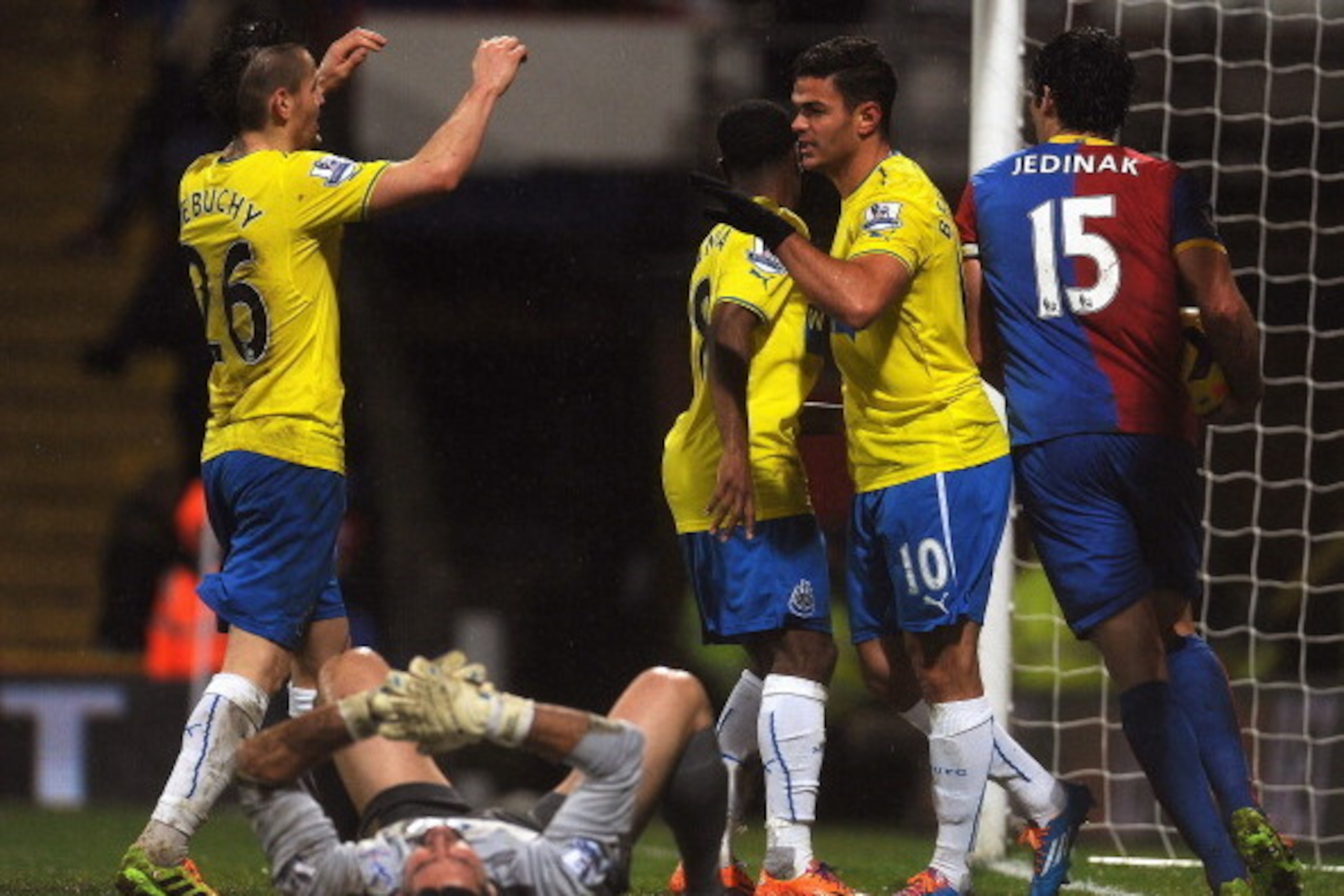 LONDON, ENGLAND - DECEMBER 21: Hatem Ben Arfa of Newcastle United (R) celebrates his goal with team-mate Mathieu Debuchy (L)  during the Barclays Premier League match between Crystal Palace and Newcastle United at Selhurst Park on December 21, 2013 in Lon