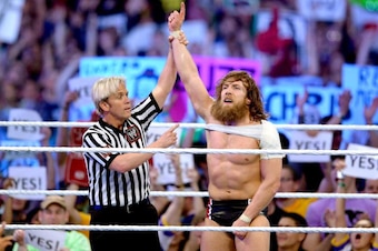 Daniel Bryan celebrates defeating Triple H at WrestleMania 30.