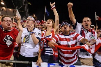 COLUMBUS, OH - SEPTEMBER 10: Fans cheer for the U.S. Men's National Team during a game against Mexico at Columbus Crew Stadium on September 10, 2013 in Columbus, Ohio. (Photo by Jamie Sabau/Getty Images)