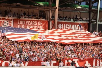 COLUMBUS, OH - SEPTEMBER 10: Fans cheer for the U.S. Men's National Team during a game against Mexico at Columbus Crew Stadium on September 10, 2013 in Columbus, Ohio. (Photo by Jamie Sabau/Getty Images)