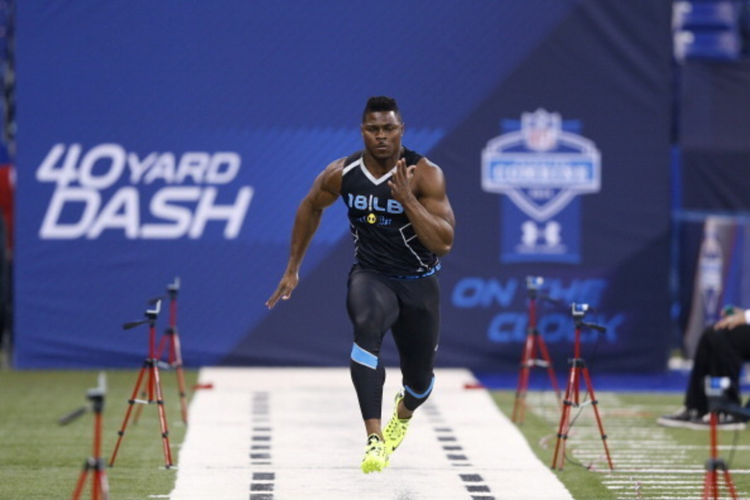INDIANAPOLIS, IN - FEBRUARY 24: Former Buffalo linebacker Khalil Mack runs the 40-yard dash during the 2014 NFL Combine at Lucas Oil Stadium on February 24, 2014 in Indianapolis, Indiana. (Photo by Joe Robbins/Getty Images)