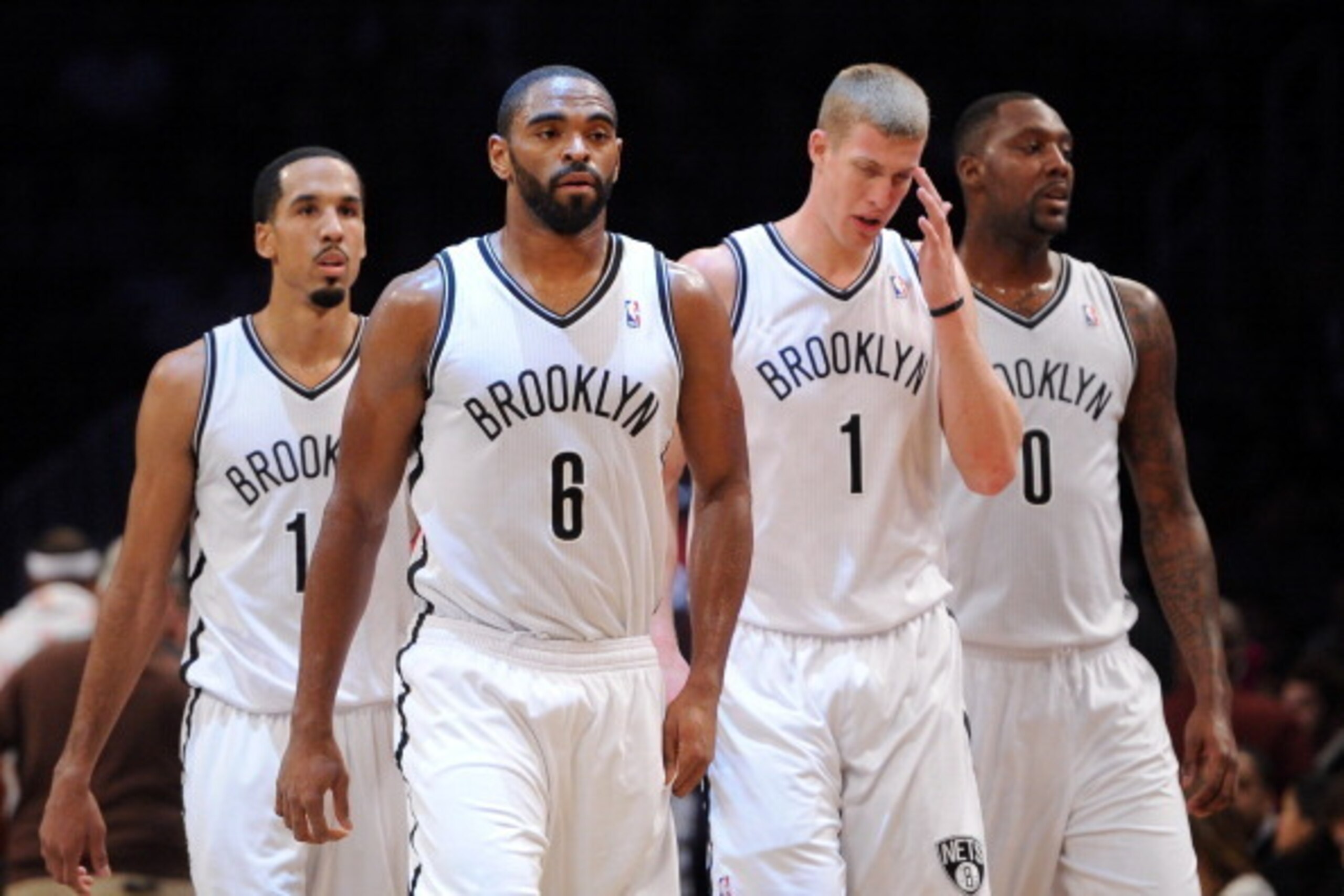 NEW YORK, NY - NOVEMBER 27:  Shaun Livingston #14, Alan Anderson #6, Mason Plumlee #1 and Andray Blatche #0 of the Brooklyn Nets walk onto the court following a timeout in the second quarter against the Los Angeles Lakers at Barclays Center on November 27