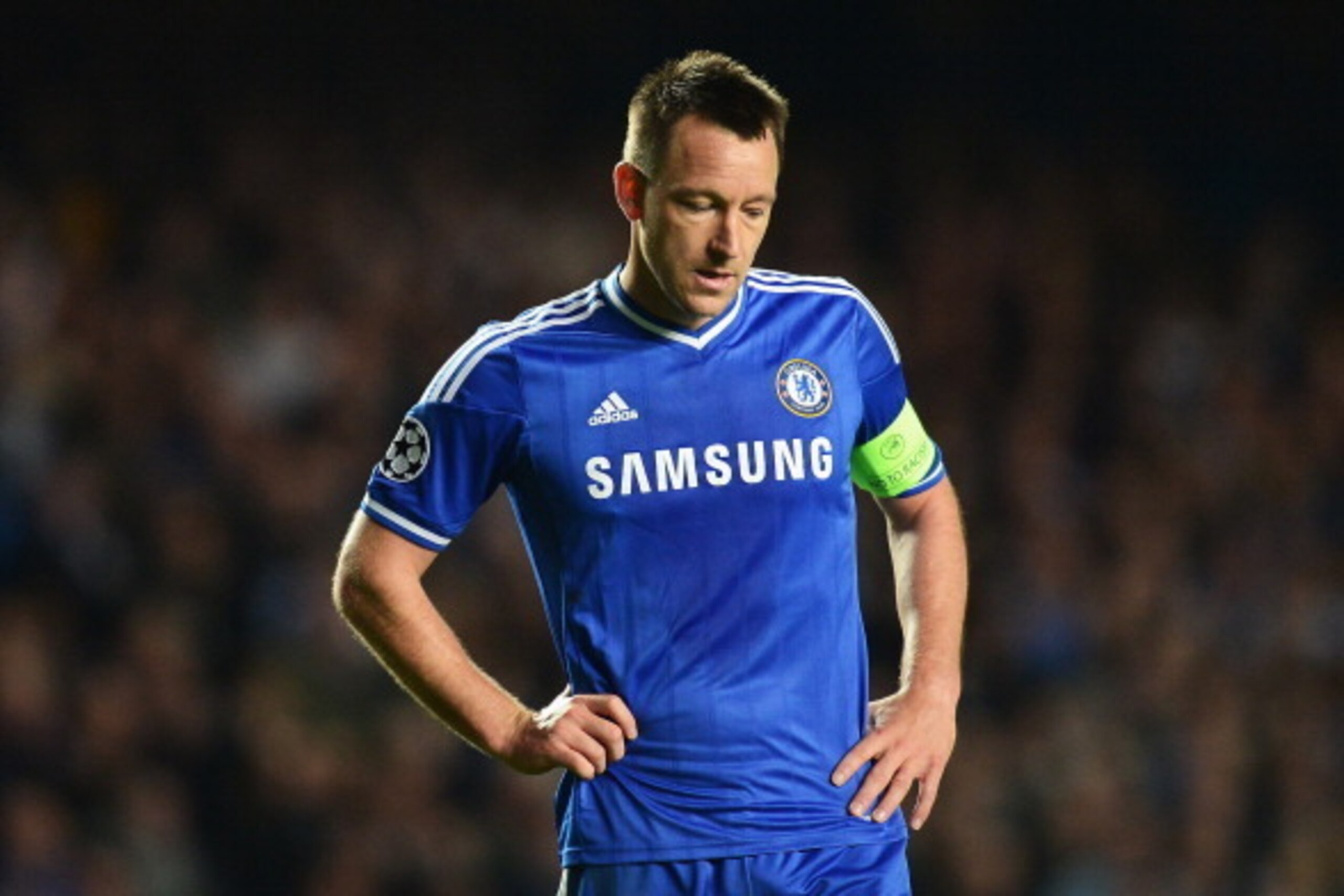 LONDON, ENGLAND - APRIL 30: John Terry of Chelsea looks dejected during the UEFA Champions League semi-final second leg match between Chelsea and Club Atletico de Madrid at Stamford Bridge on April 30, 2014 in London, England. (Photo by Jamie McDonald/G LONDON, ENGLAND - APRIL 30: John Terry of Chelsea looks dejected during the UEFA Champions League semi-final second leg match between Chelsea and Club Atletico de Madrid at Stamford Bridge on April 30, 2014 in London, England. (Photo by Jamie McDonald/G