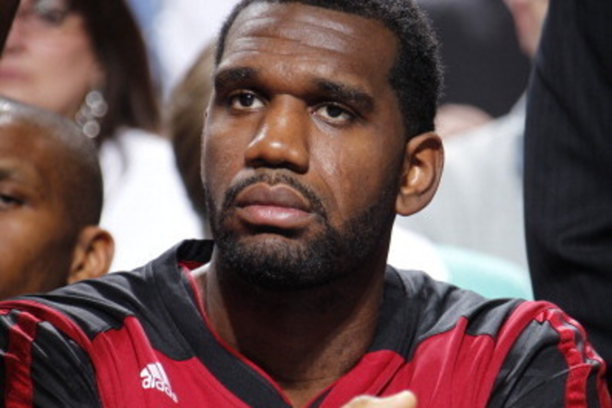 DALLAS, TX - FEBRUARY 18: Greg Oden #20 of the Miami Heat on the bench during a game against the Dallas Mavericks on February 18, 2014 at the American Airlines Center in Dallas, Texas. NOTE TO USER: User expressly acknowledges and agrees that, by download