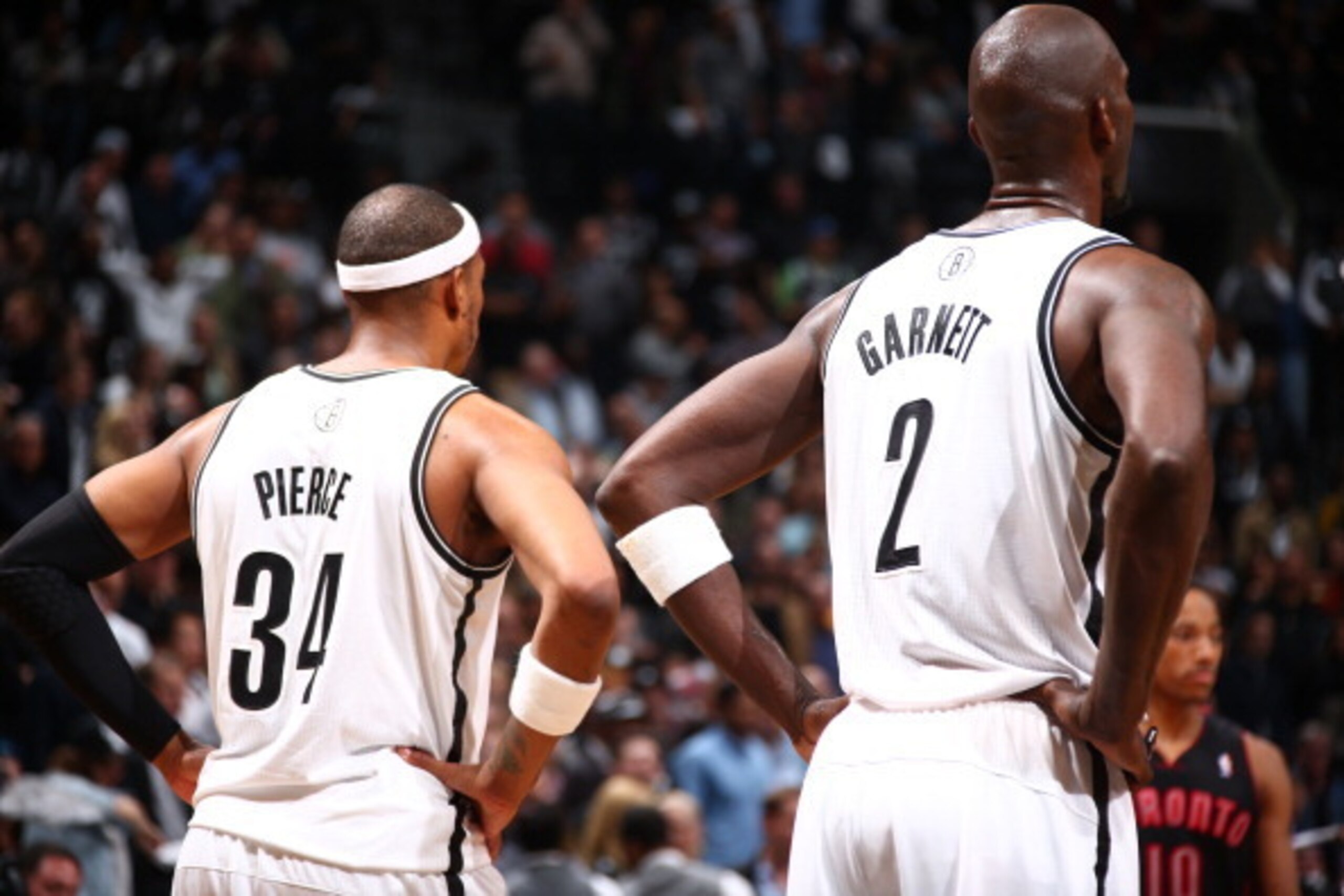 BROOKLYN, NY - APRIL 25: Paul Pierce #34 and Kevin Garnett #2 of the Brooklyn Nets look on in Game Three of the Eastern Conference Quarterfinals against the Toronto Raptors during the NBA Playoffs on April 25, 2014 at the Barclays Center in Brooklyn, New 