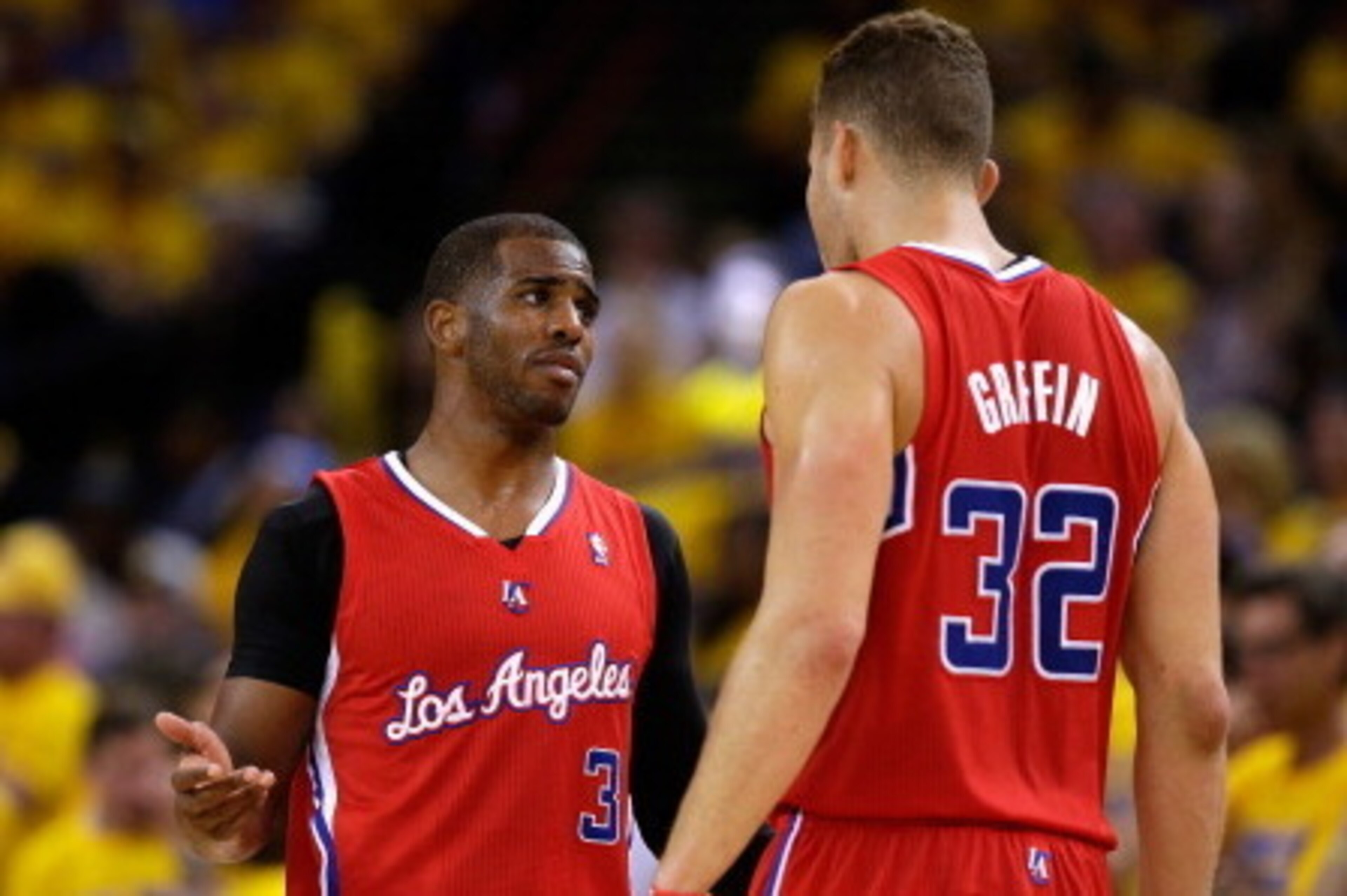 OAKLAND, CA - MAY 01:  Blake Griffin #32 talks to Chris Paul #3 of the Los Angeles Clippers during their game against the Golden State Warriors in Game Six of the Western Conference Quarterfinals during the 2014 NBA Playoffs at ORACLE Arena on May 1, 2014