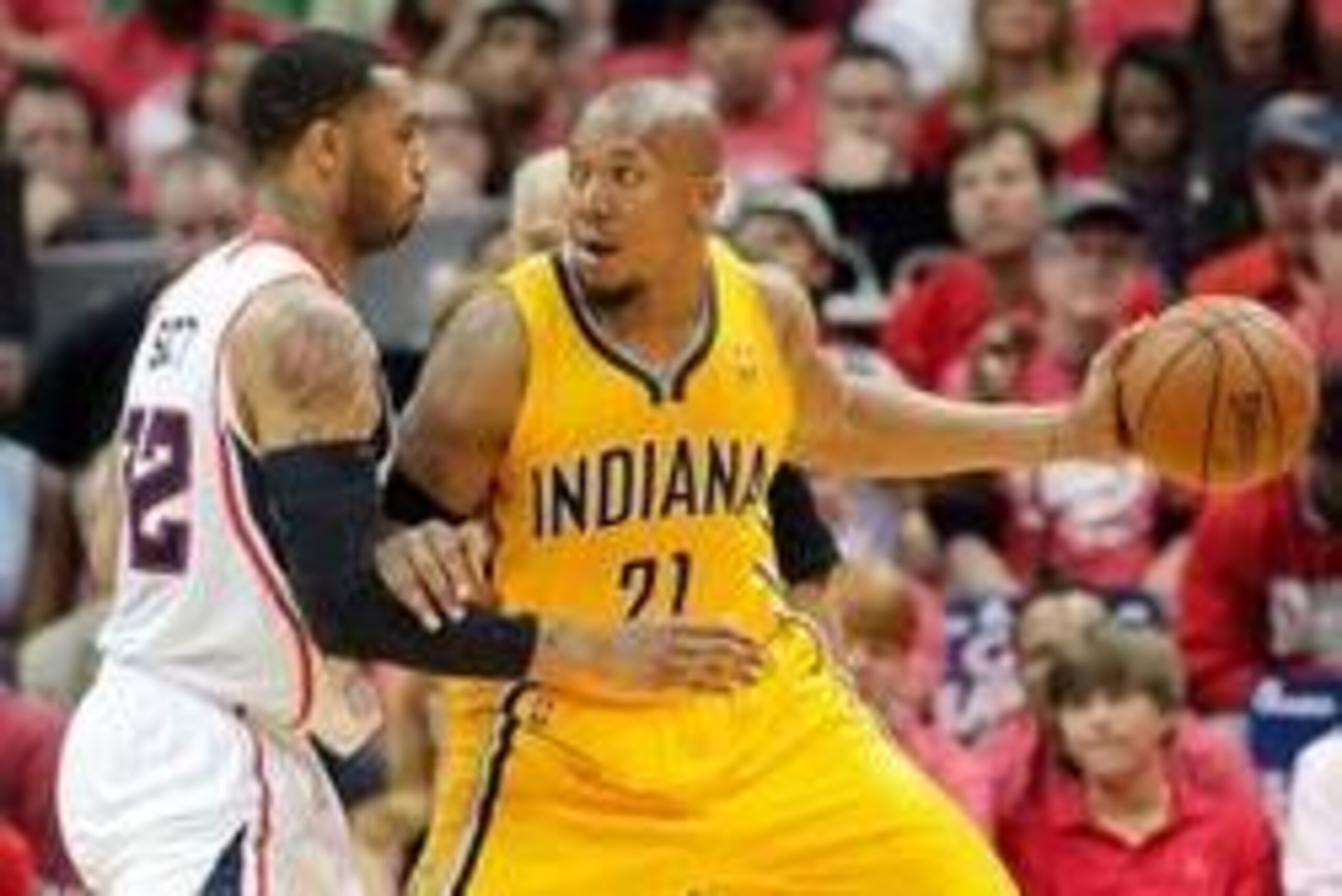 May 1, 2014; Atlanta, GA, USA;Indiana Pacers forward David West (21) drives into Atlanta Hawks forward Mike Scott (32) in game six of the first round of the 2014 NBA Playoffs at Philips Arena. Mandatory Credit: Marvin Gentry-USA TODAY Sports