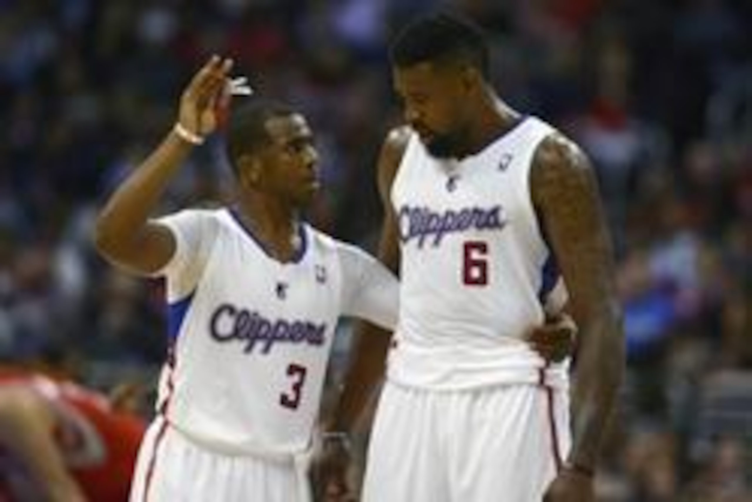 Feb 26, 2014; Los Angeles, CA, USA; Los Angeles Clippers guard Chris Paul (3) speaks to Los Angeles Clippers center DeAndre Jordan (6) during a break in play during the second quarter at Staples Center. Mandatory Credit: Kelvin Kuo-USA TODAY Sports