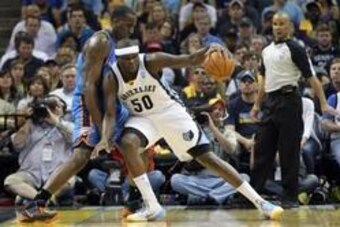 Apr 26, 2014; Memphis, TN, USA; Memphis Grizzlies forward Zach Randolph (50) drives against Oklahoma City Thunder center Kendrick Perkins (5) during game four of the first round of the 2014 NBA Playoffs at FedExForum. Thunder defeated the Grizzlies 92-89.