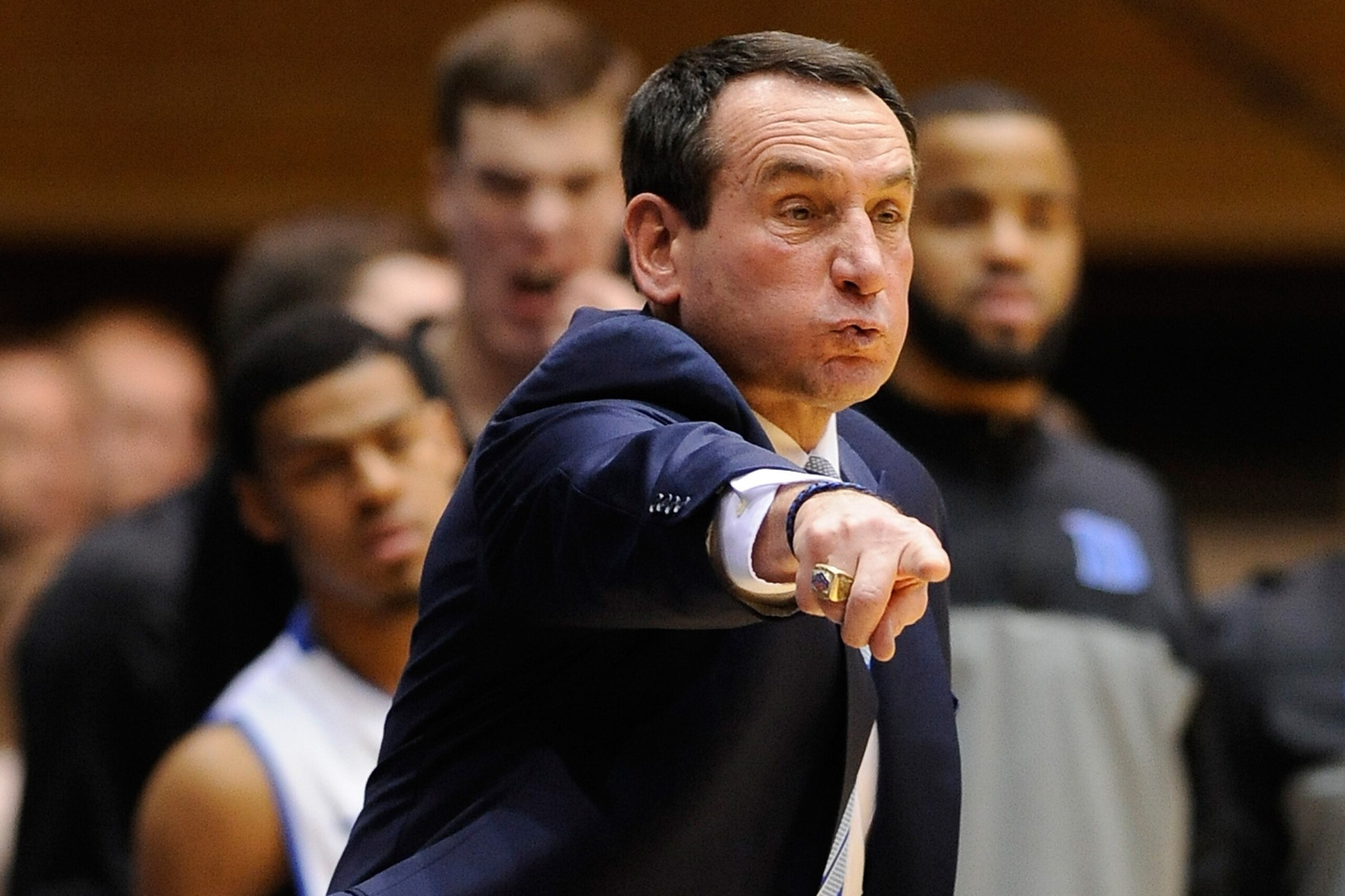 DURHAM, NC - FEBRUARY 25:  Head coach Mike Krzyzewski of the Duke Blue Devils directs his team against the Virginia Tech Hokies during their game at Cameron Indoor Stadium on February 25, 2014 in Durham, North Carolina. Duke won 66-48.  (Photo by Grant Ha