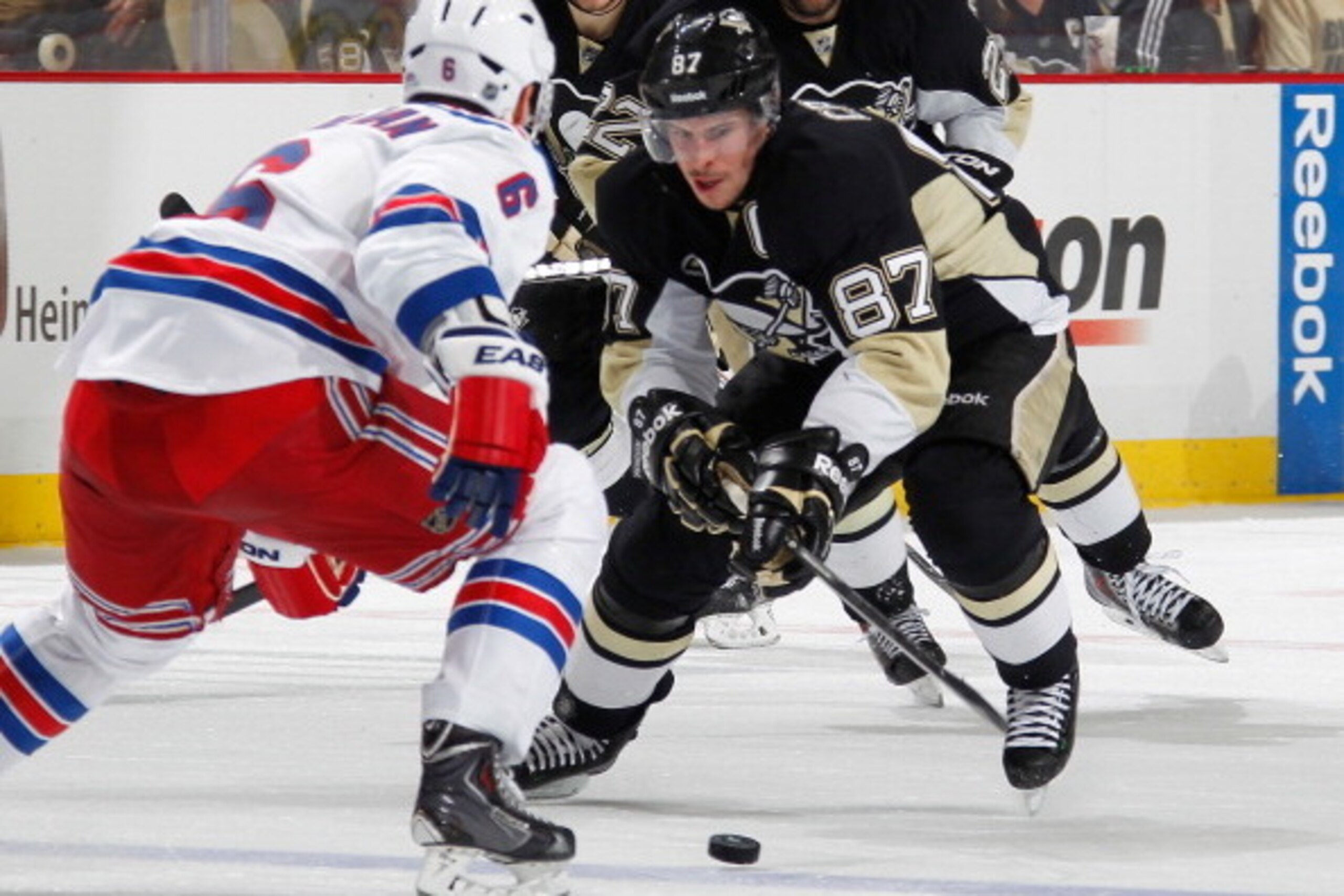 PITTSBURGH, PA - MAY 2:  Sidney Crosby #87 of the Pittsburgh Penguins moves the puck up ice in front of Anton Stralman #6 of the New York Rangers in Game One of the Second Round of the 2014 Stanley Cup Playoffs at Consol Energy Center on May 2, 2014 in Pi