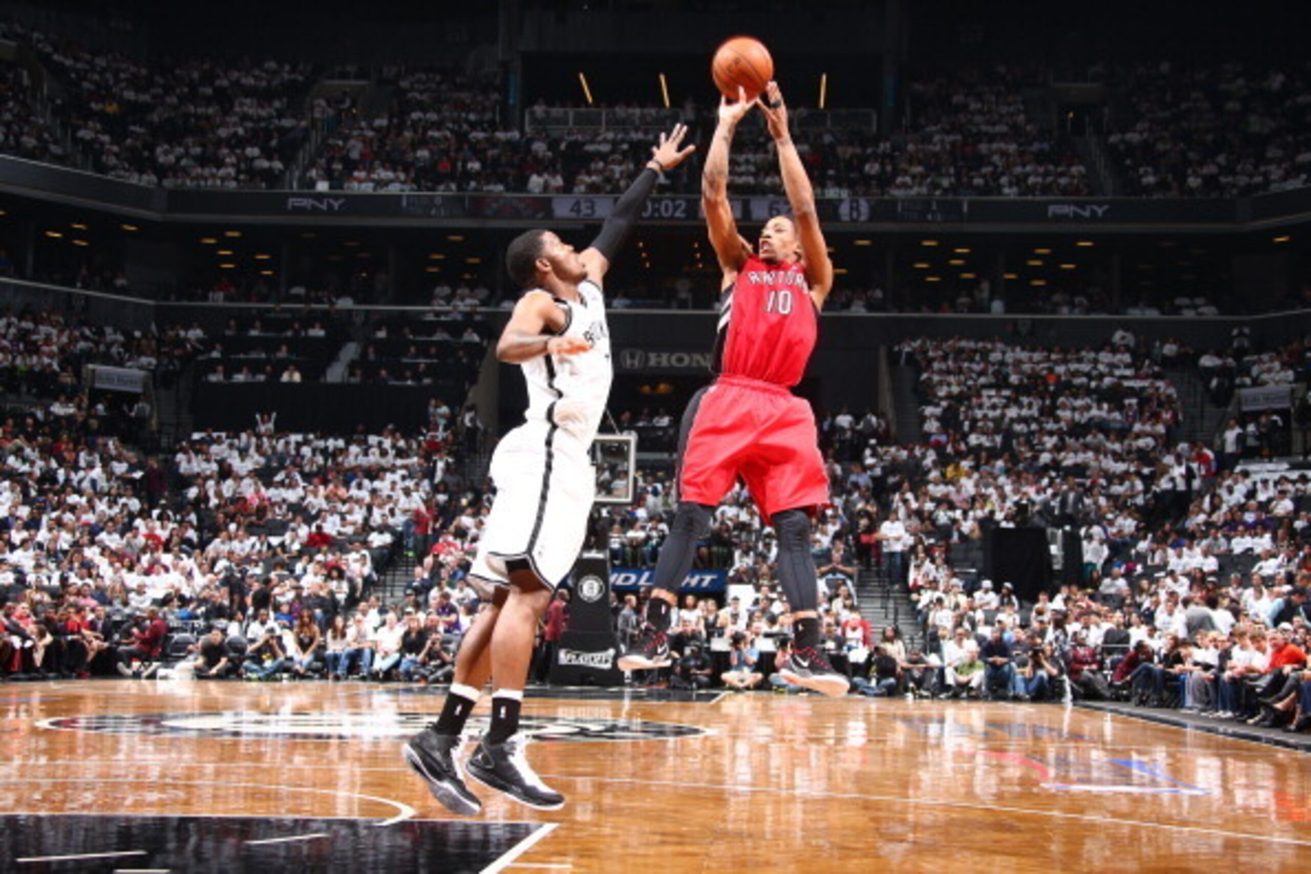 BROOKLYN, NY - MAY 2: DeMar DeRozan #10 of the Toronto Raptors shoots the ball against the Brooklyn Nets during Game Six of the Eastern Conference Quarterfinals at Barclays Center on May 2, 2014 in the Brooklyn borough of New York City.  NOTE TO USER: Use