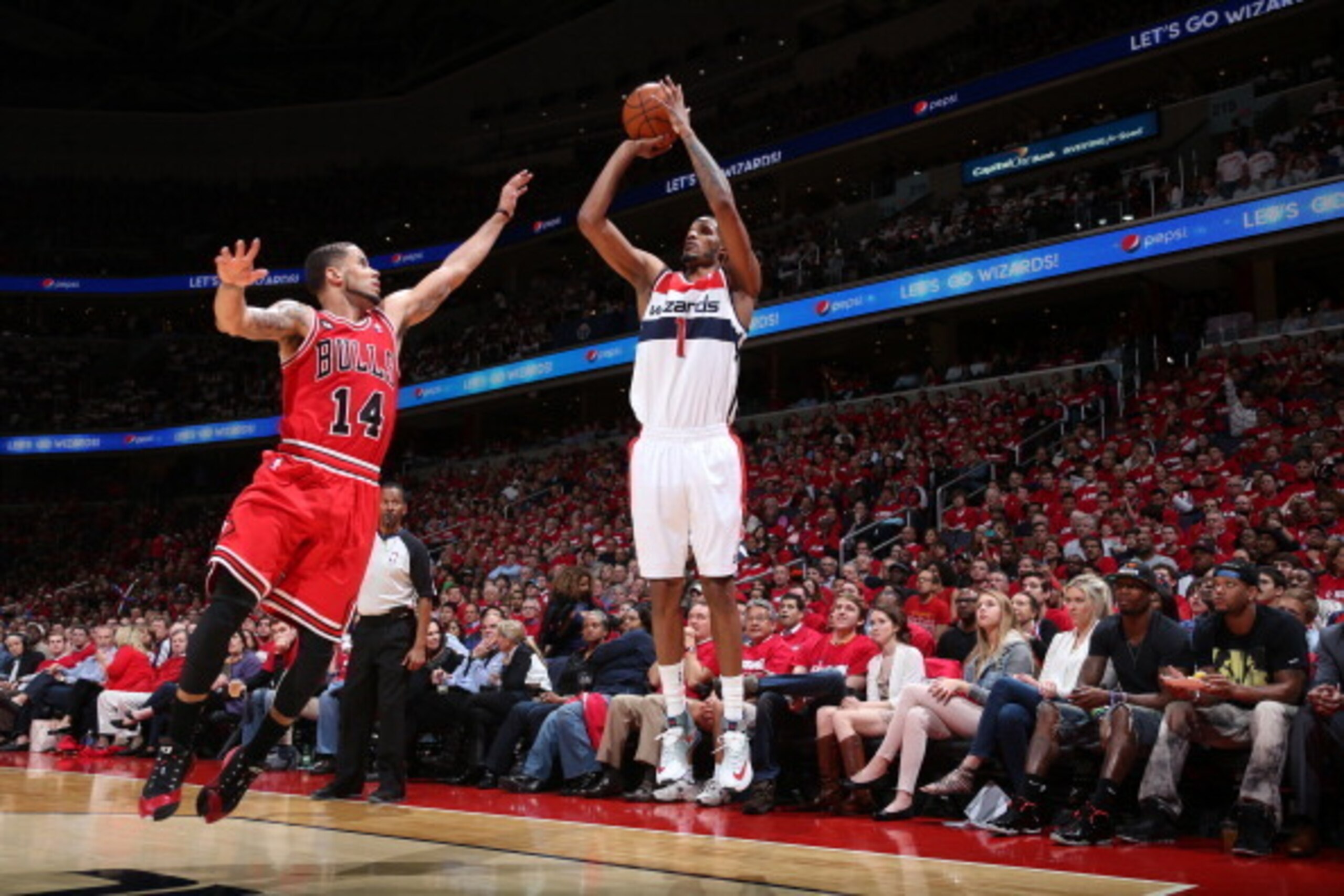 WASHINGTON, DC - APRIL 25: Trevor Ariza #1 of the Washington Wizards shoots the ball against the Chicago Bulls in Game Three of the Eastern Conference Quarterfinals during the 2014 NBA Playoffs at the Verizon Center on April 25, 2014 in Washington, DC. NO