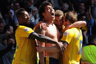 NOTTINGHAM, ENGLAND - MAY 03:  Leonardo Ulloa of Brighton & Hove Albion celebrates scoring the winning goal during the Sky Bet Championship match between Nottingham Forest and Brighton & Hove Albion at City Ground on May 03, 2014 in Nottingham, England,  