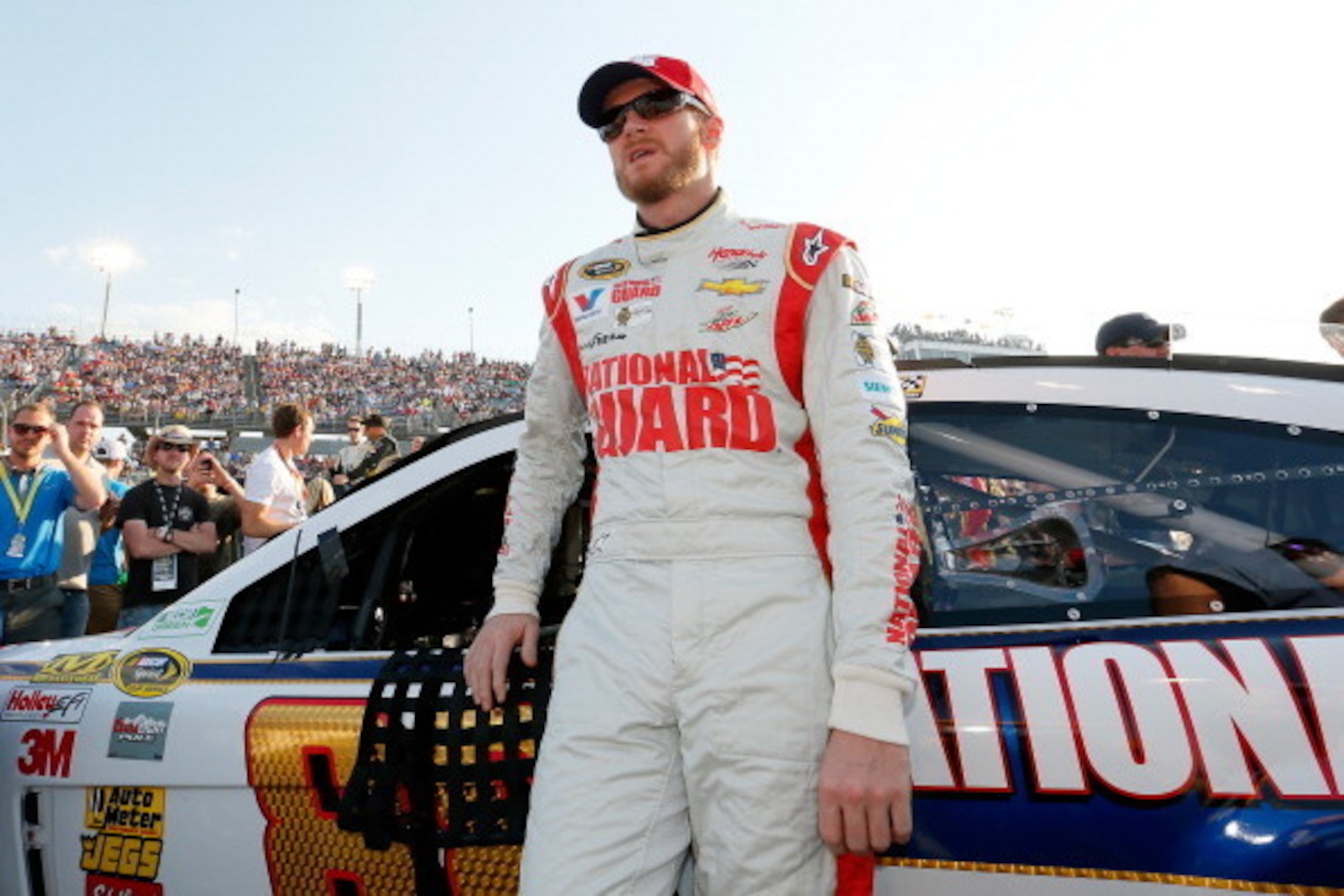 DARLINGTON, SC - APRIL 12: Dale Earnhardt Jr., driver of the #88 National Guard Chevrolet, stands on the grid prior to the NASCAR Sprint Cup Series Bojangles' Southern 500 at Darlington Raceway on April 12, 2014 in Darlington, South Carolina.  (Photo by K