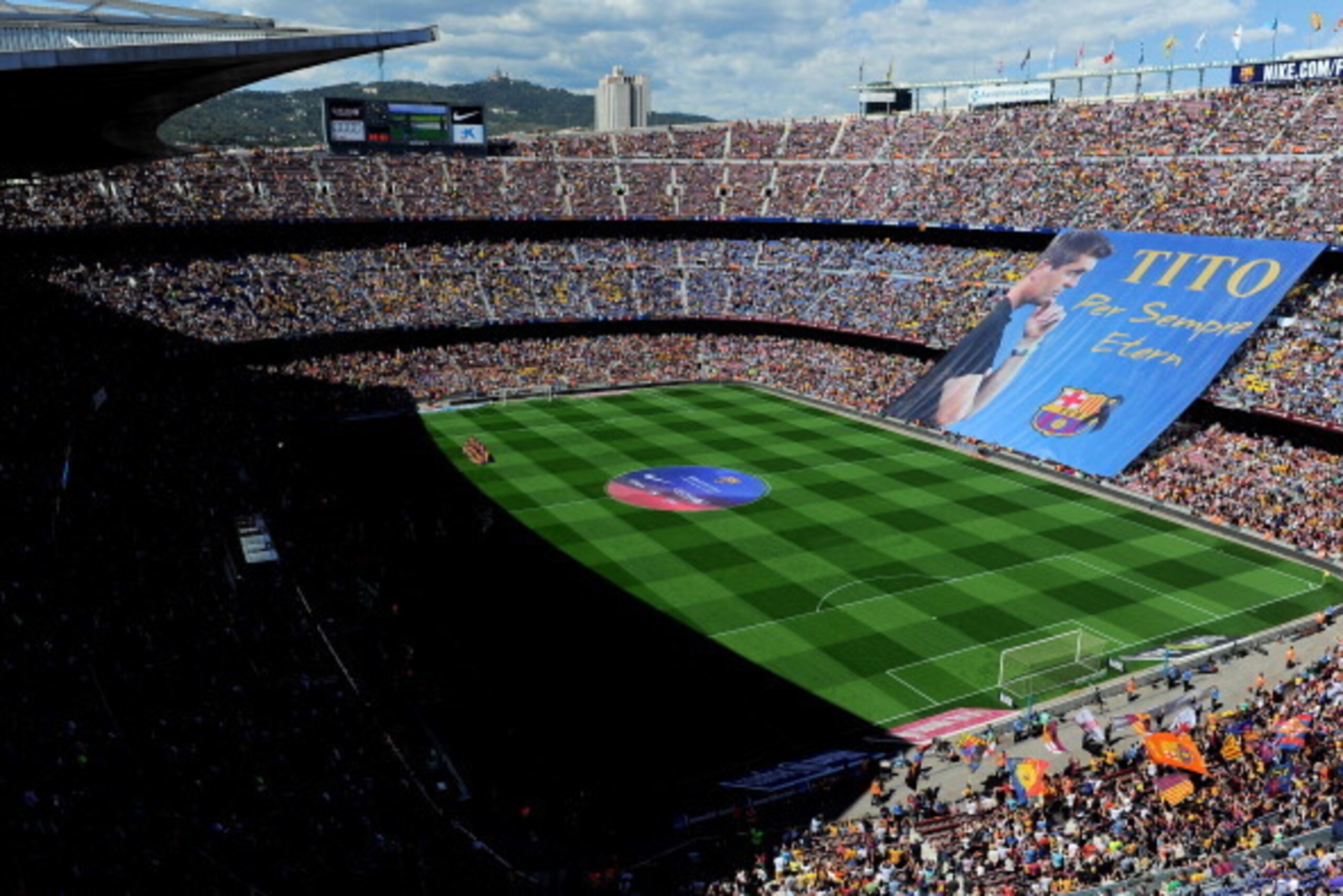 BARCELONA, SPAIN - MAY 03:  FC Barcelona fans display a huge banner in memory of former FC Barcelona head coach Tito Vilanova prior to the La Liga match between FC Barcelona and Getafe CF at Nou Camp on May 3, 2014 in Barcelona, Spain.  (Photo by David Ra