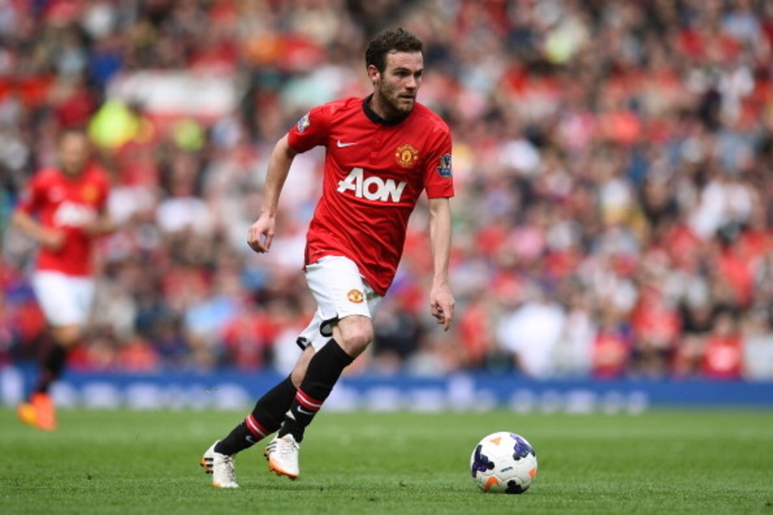 MANCHESTER, ENGLAND - MAY 03:  Juan Mata of Manchester United runs with the ball during the Barclays Premier League match between Manchester United and Sunderland at Old Trafford on May 3, 2014 in Manchester, England.  (Photo by Shaun Botterill/Getty Imag