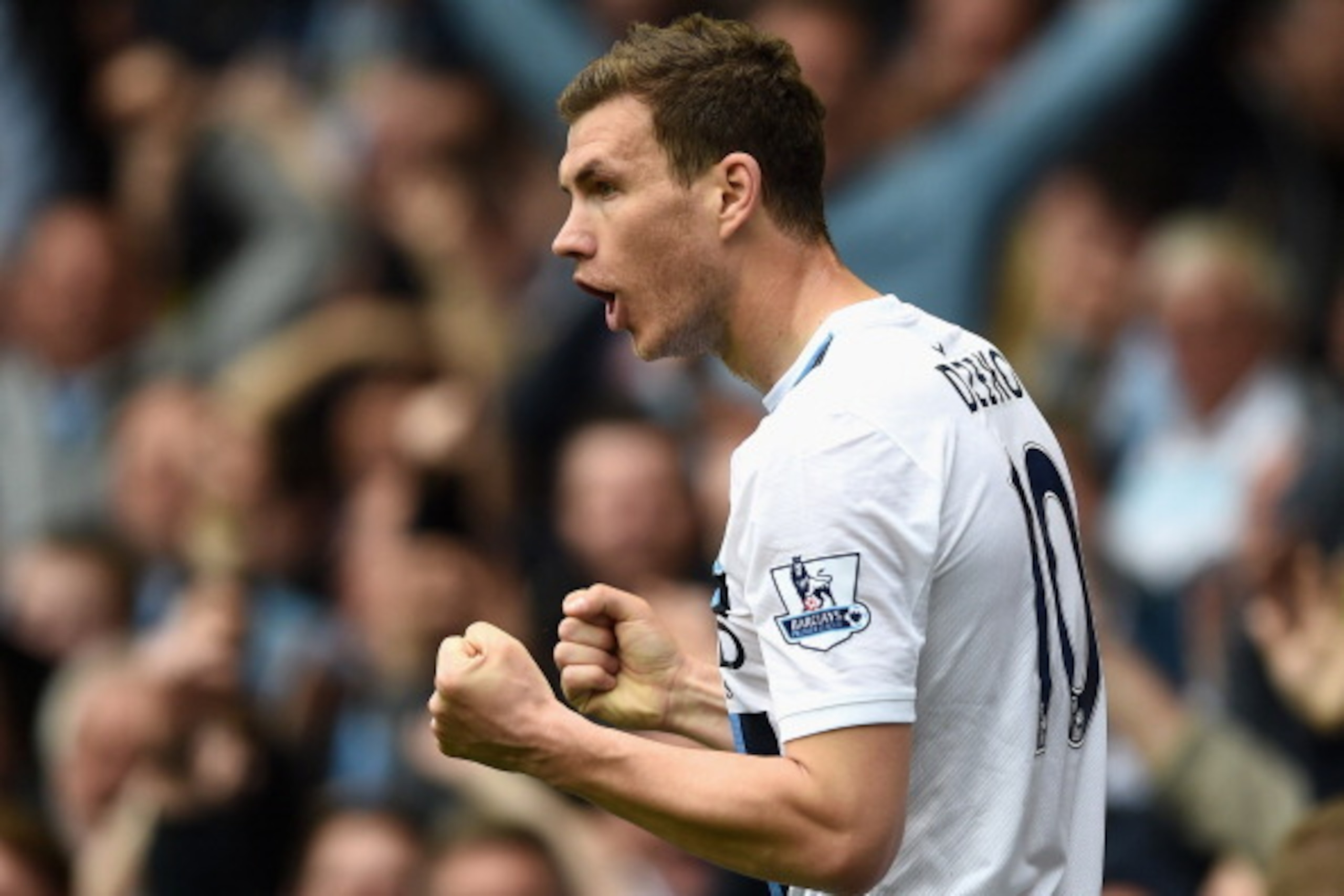 LIVERPOOL, ENGLAND - MAY 03:  Edin Dzeko of Manchester City celebrates scoring his team's second goal during the Barclays Premier League match between Everton and Manchester City at Goodison Park on May 3, 2014 in Liverpool, England.  (Photo by Laurence G