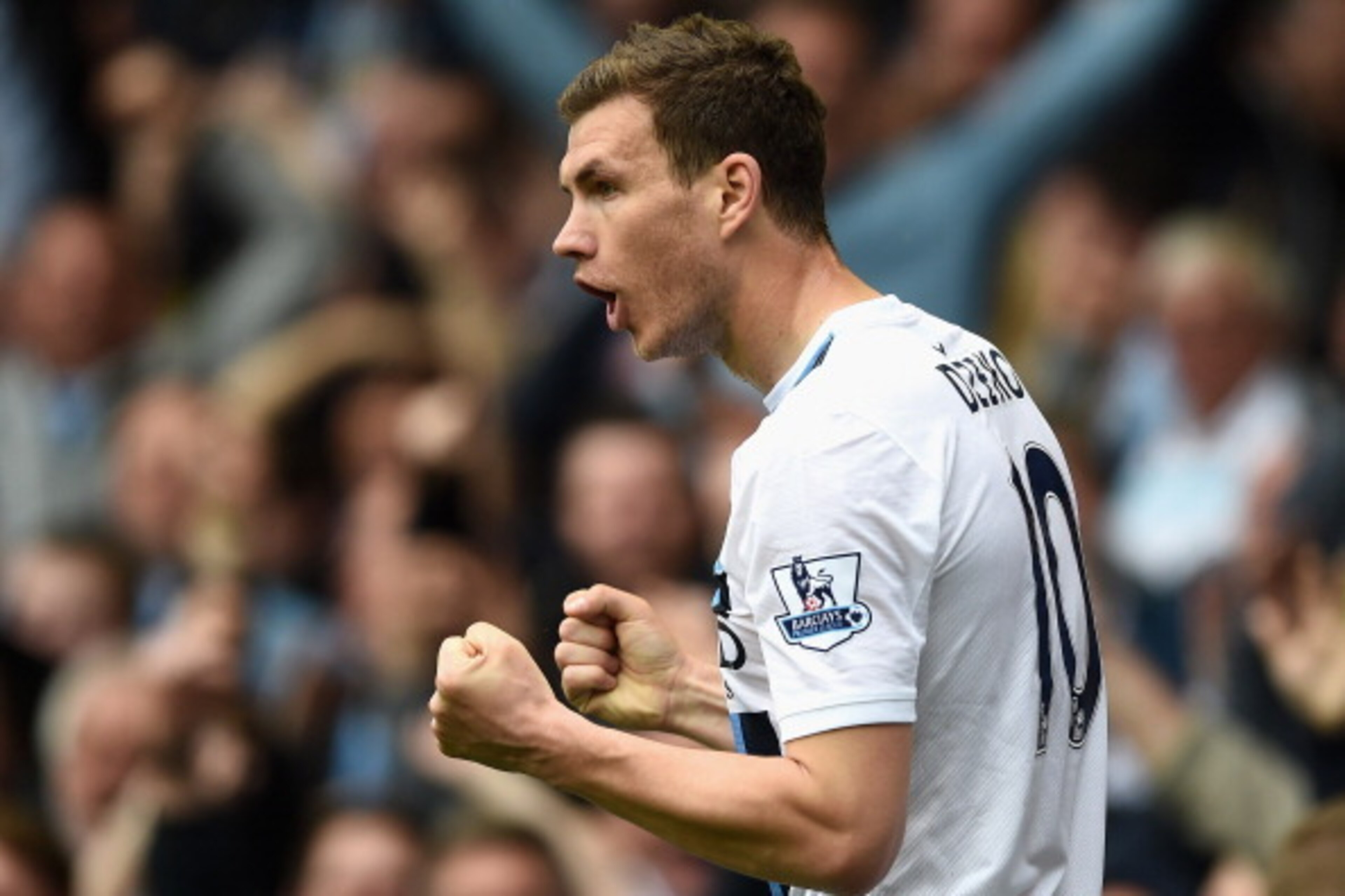 LIVERPOOL, ENGLAND - MAY 03: Edin Dzeko of Manchester City celebrates scoring his team's second goal during the Barclays Premier League match between Everton and Manchester City at Goodison Park on May 3, 2014 in Liverpool, England. (Photo by Laurence G LIVERPOOL, ENGLAND - MAY 03: Edin Dzeko of Manchester City celebrates scoring his team's second goal during the Barclays Premier League match between Everton and Manchester City at Goodison Park on May 3, 2014 in Liverpool, England. (Photo by Laurence G