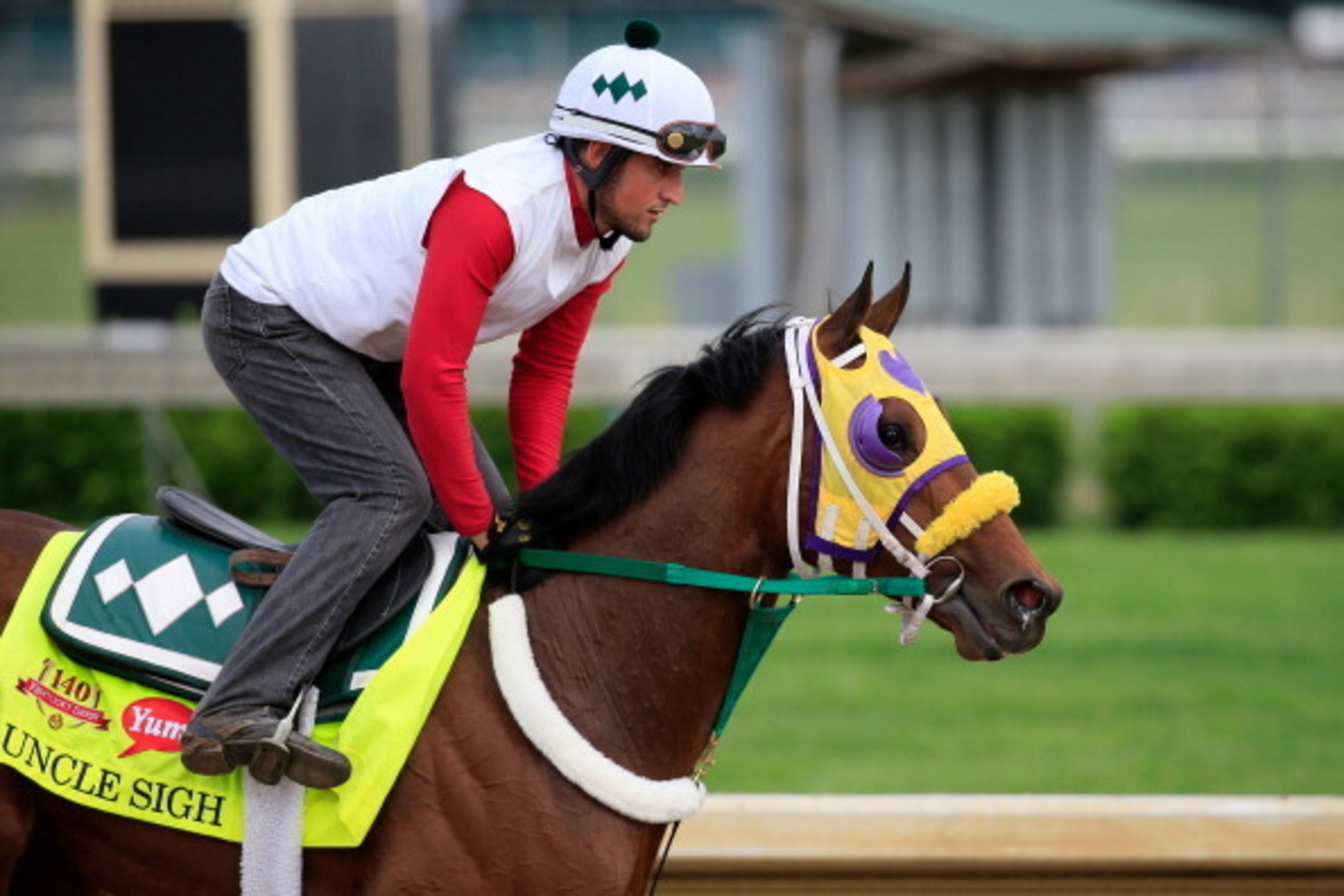 LOUISVILLE, KY - APRIL 29: Uncle Sigh is ridden by Nick Santagata during the morning exercise session in preparation for the140th Kentucky Derby at Churchill Downs on April 29, 2014 in Louisville, Kentucky. (Photo by Rob Carr/Getty Images) LOUISVILLE, KY - APRIL 29: Uncle Sigh is ridden by Nick Santagata during the morning exercise session in preparation for the140th Kentucky Derby at Churchill Downs on April 29, 2014 in Louisville, Kentucky. (Photo by Rob Carr/Getty Images)