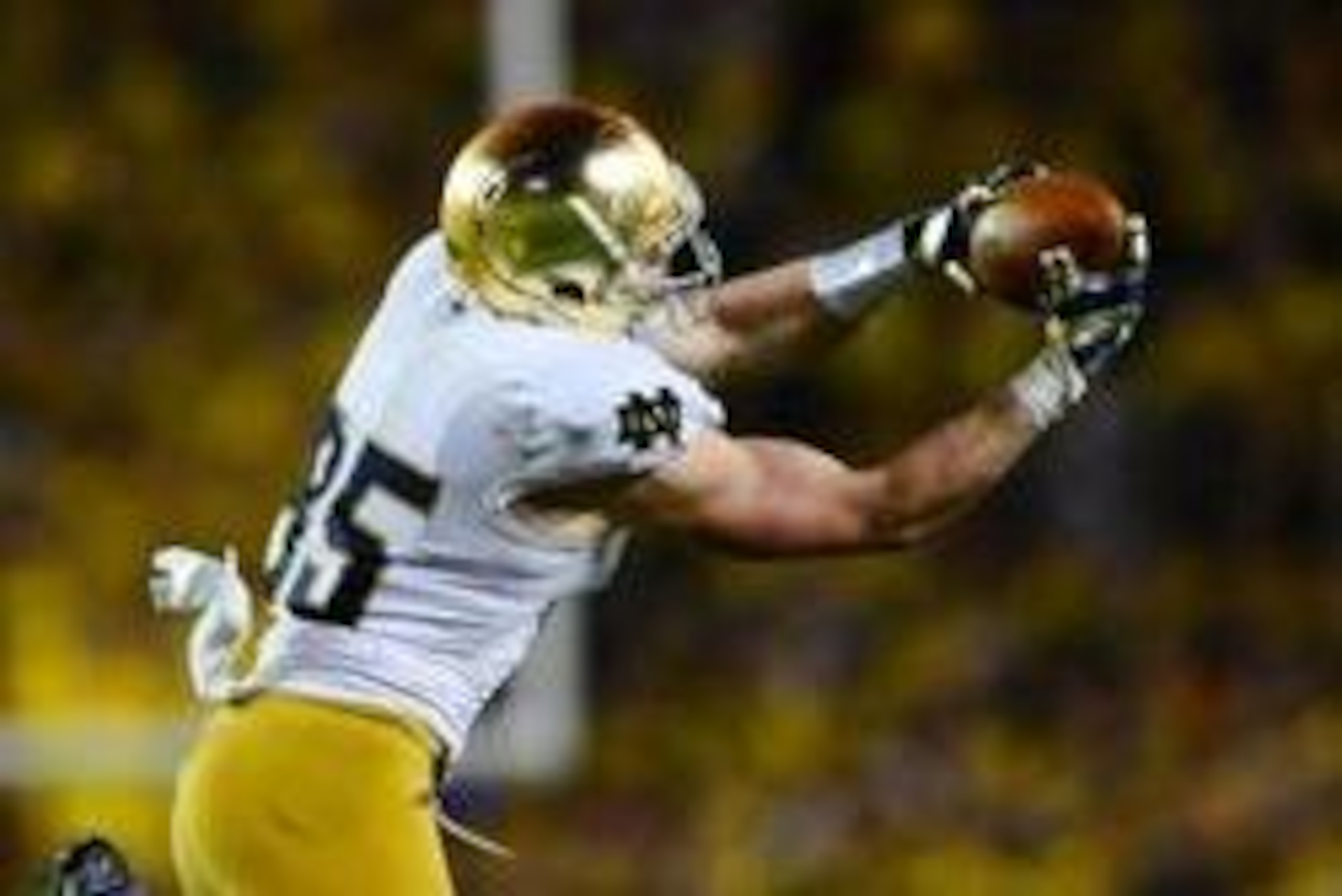 Sep 7, 2013; Ann Arbor, MI, USA; Notre Dame Fighting Irish tight end Troy Niklas (85) makes a catch during the fourth quarter against the Michigan Wolverines at Michigan Stadium. Michigan Wolverines defeated Notre Dame Fighting Irish 41-30. Mandatory Cred