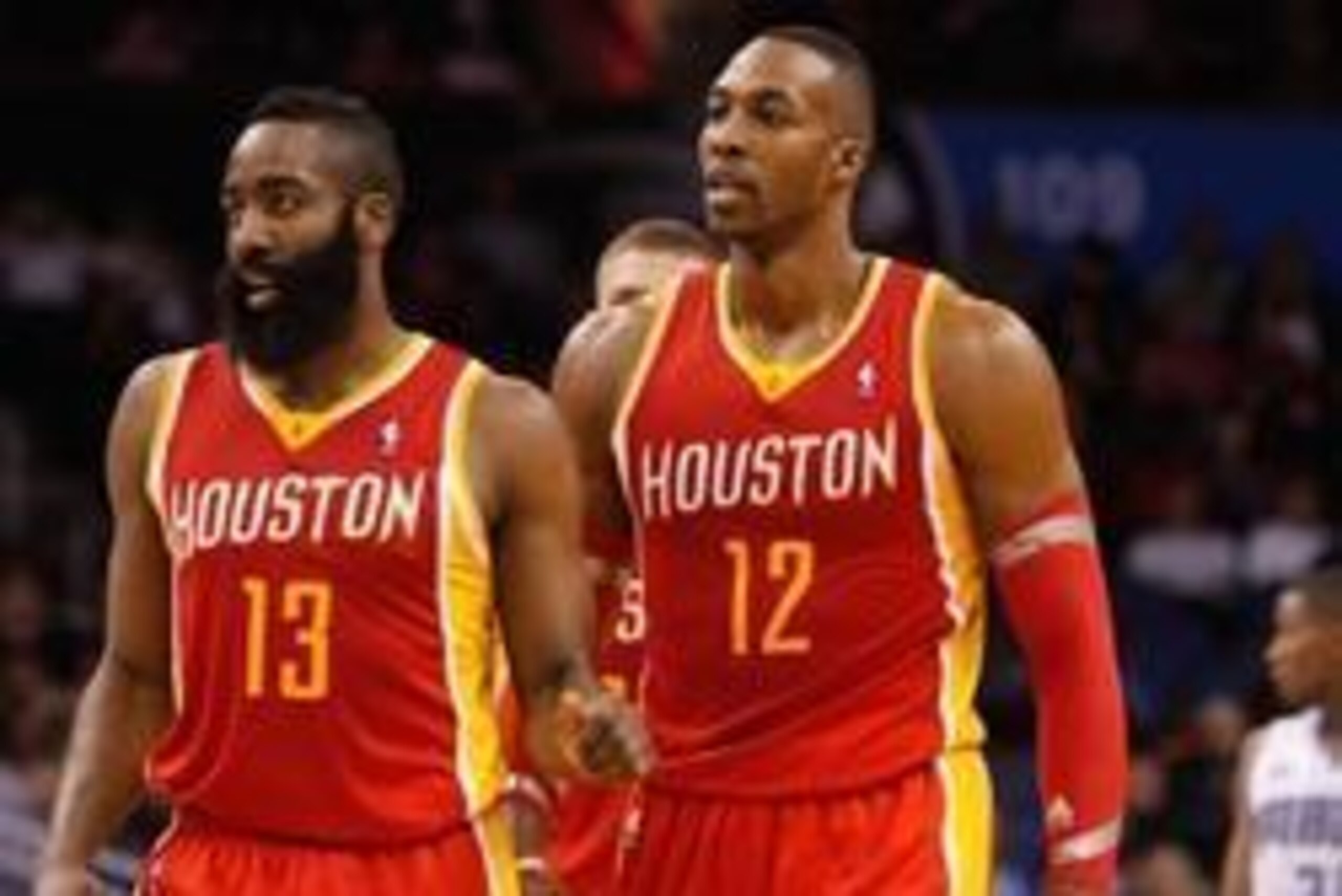 Mar 5, 2014; Orlando, FL, USA; Houston Rockets shooting guard James Harden (13) and Houston Rockets center Dwight Howard (12) against the Orlando Magic during the second half at Amway Center. Houston Rockets defeated the Orlando Magic 101-89. Mandatory C Mar 5, 2014; Orlando, FL, USA; Houston Rockets shooting guard James Harden (13) and Houston Rockets center Dwight Howard (12) against the Orlando Magic during the second half at Amway Center. Houston Rockets defeated the Orlando Magic 101-89. Mandatory C