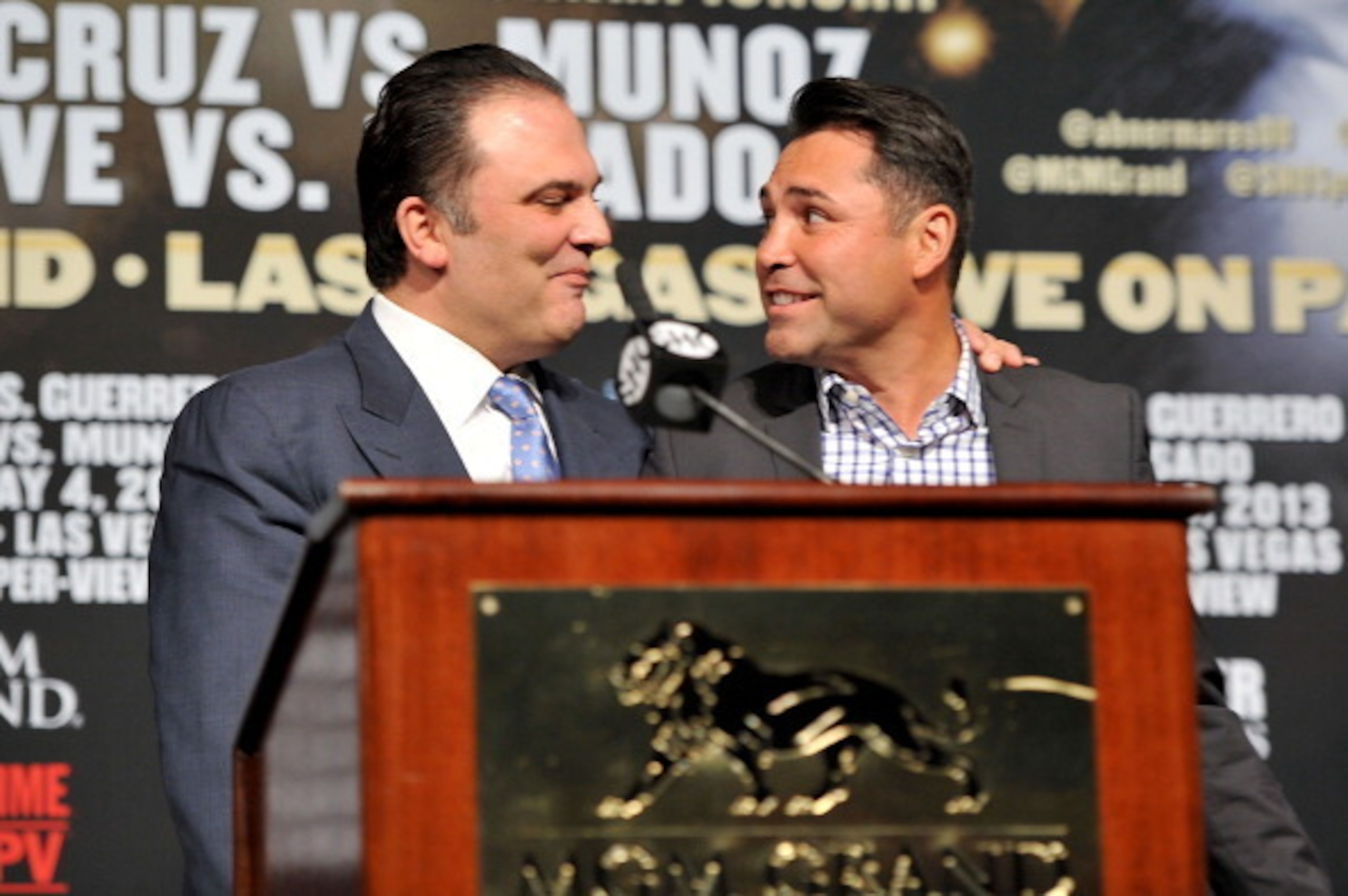 LAS VEGAS, NV - MAY 01: CEO of Golden Boy Promotions Richard Schaefer (L) introduces President of Golden Boy Promotions Oscar De La Hoya at the final news conference for the bout between Floyd Mayweather Jr. and Robert Guerrero at the MGM Grand Hotel/Cas LAS VEGAS, NV - MAY 01: CEO of Golden Boy Promotions Richard Schaefer (L) introduces President of Golden Boy Promotions Oscar De La Hoya at the final news conference for the bout between Floyd Mayweather Jr. and Robert Guerrero at the MGM Grand Hotel/Cas
