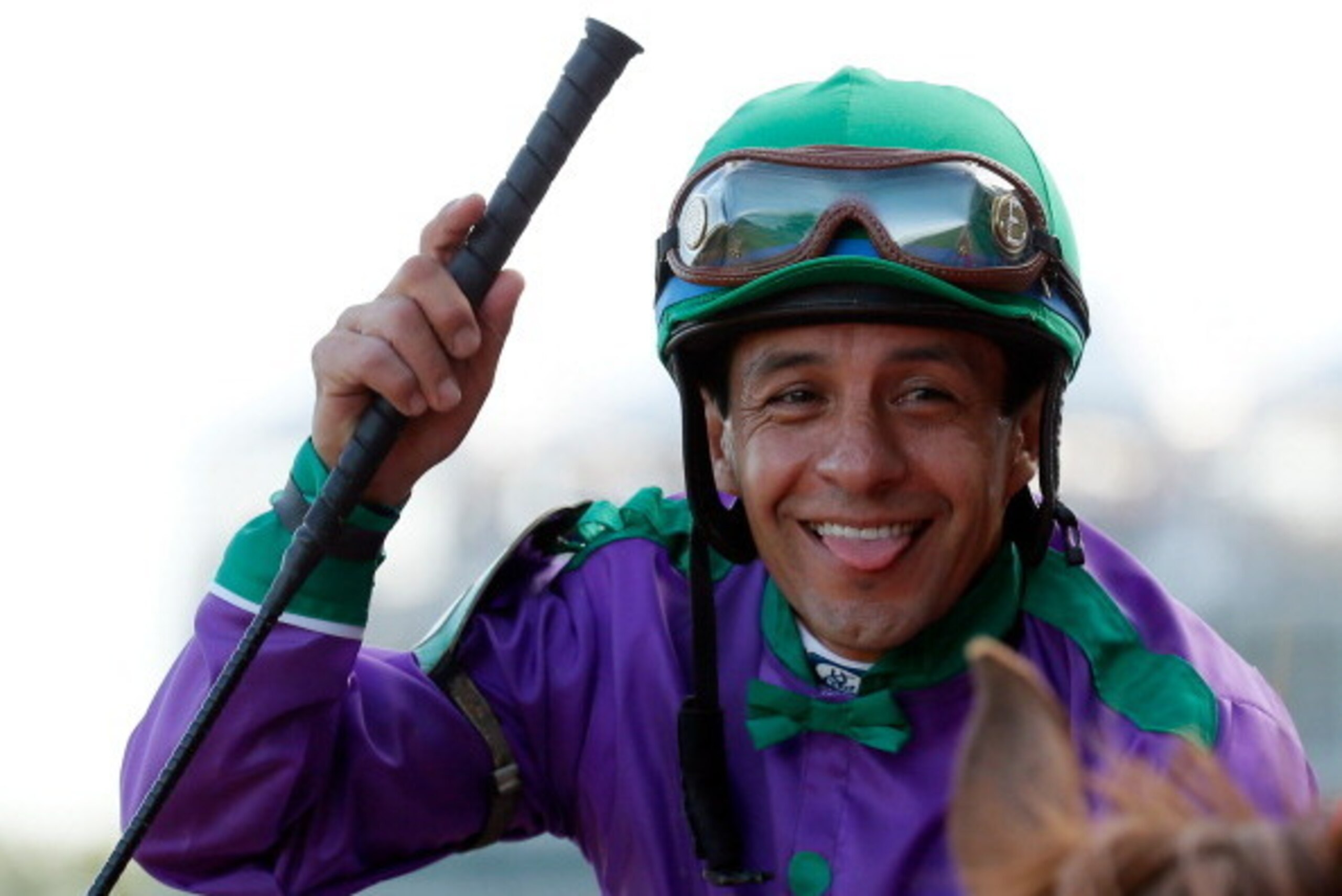 LOUISVILLE, KY - MAY 03:  Jockey Victor Espinoza smiles atop of California Chrome #5 after winning the 140th running of the Kentucky Derby at Churchill Downs on May 3, 2014 in Louisville, Kentucky.  (Photo by Kevin C. Cox/Getty Images)