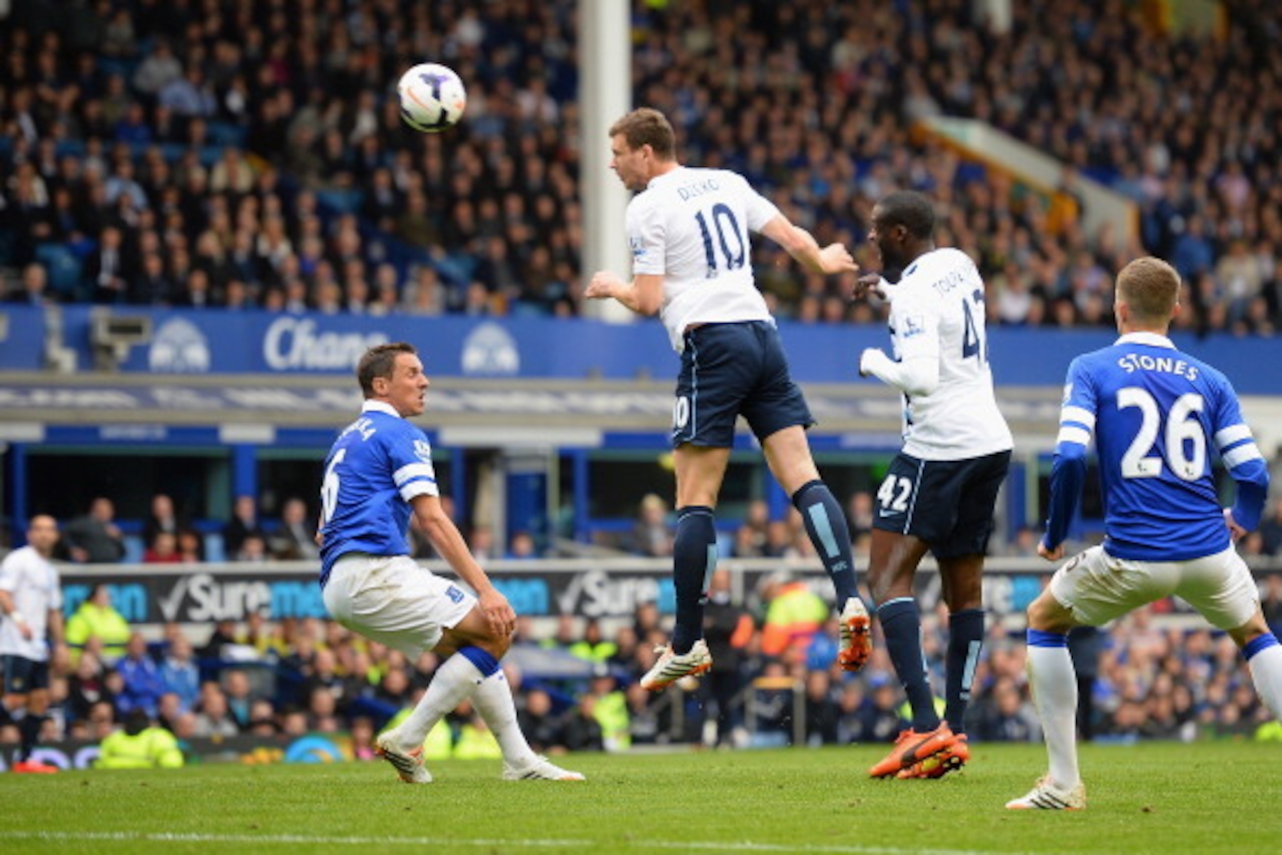 LIVERPOOL, ENGLAND - MAY 03:  Edin Dzeko of Manchester City scores his team's second goal during the Barclays Premier League match between Everton and Manchester City at Goodison Park on May 3, 2014 in Liverpool, England.  (Photo by Laurence Griffiths/Get