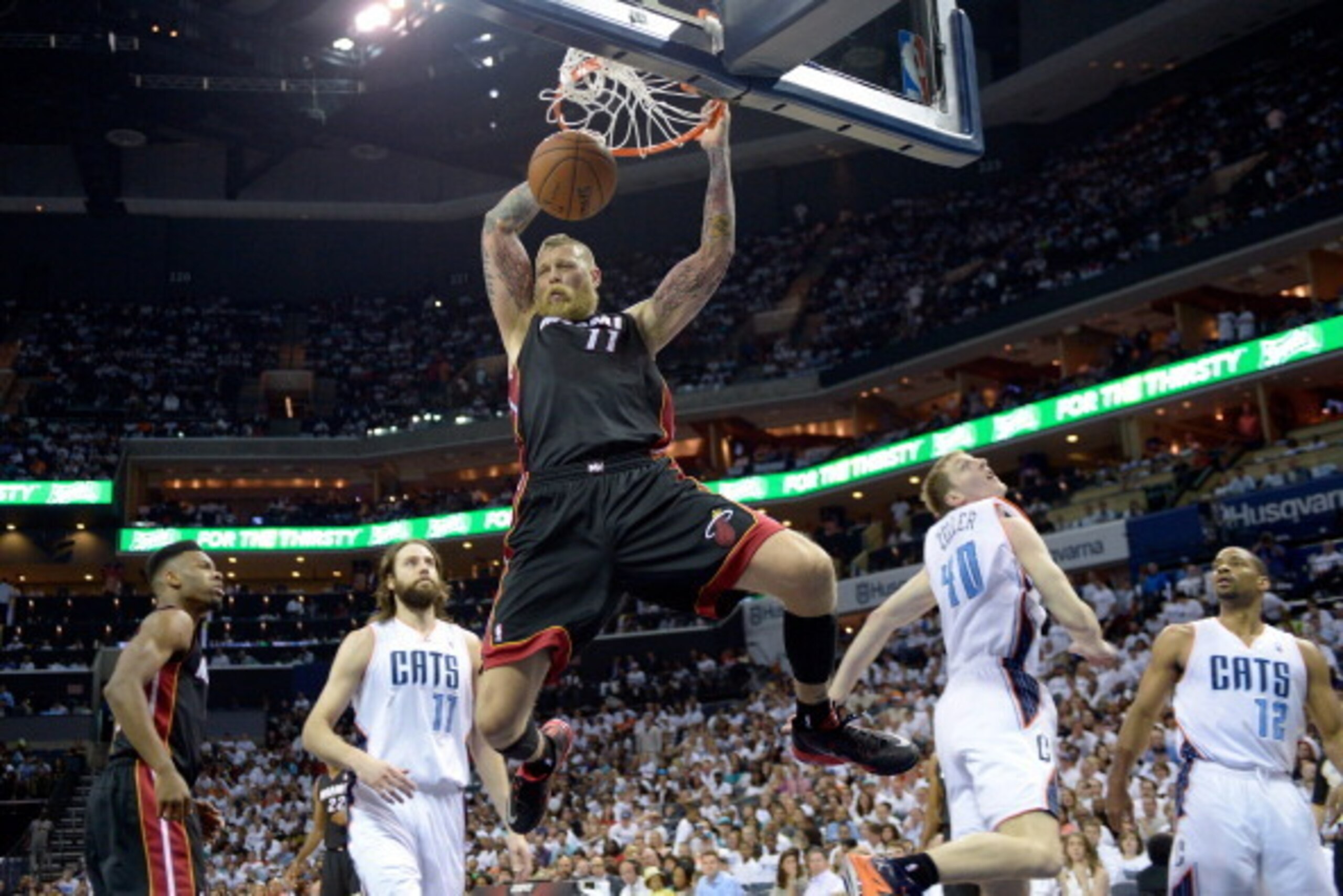 CHARLOTTE, NC - APRIL 26:  Chris Andersen #11 of the Miami Heat dunks against the Charlotte Bobcats in Game Three of the Eastern Conference Quarterfinals during the 2014 NBA Playoffs at Time Warner Cable Arena on April 26, 2014 in Charlotte, North Carolin