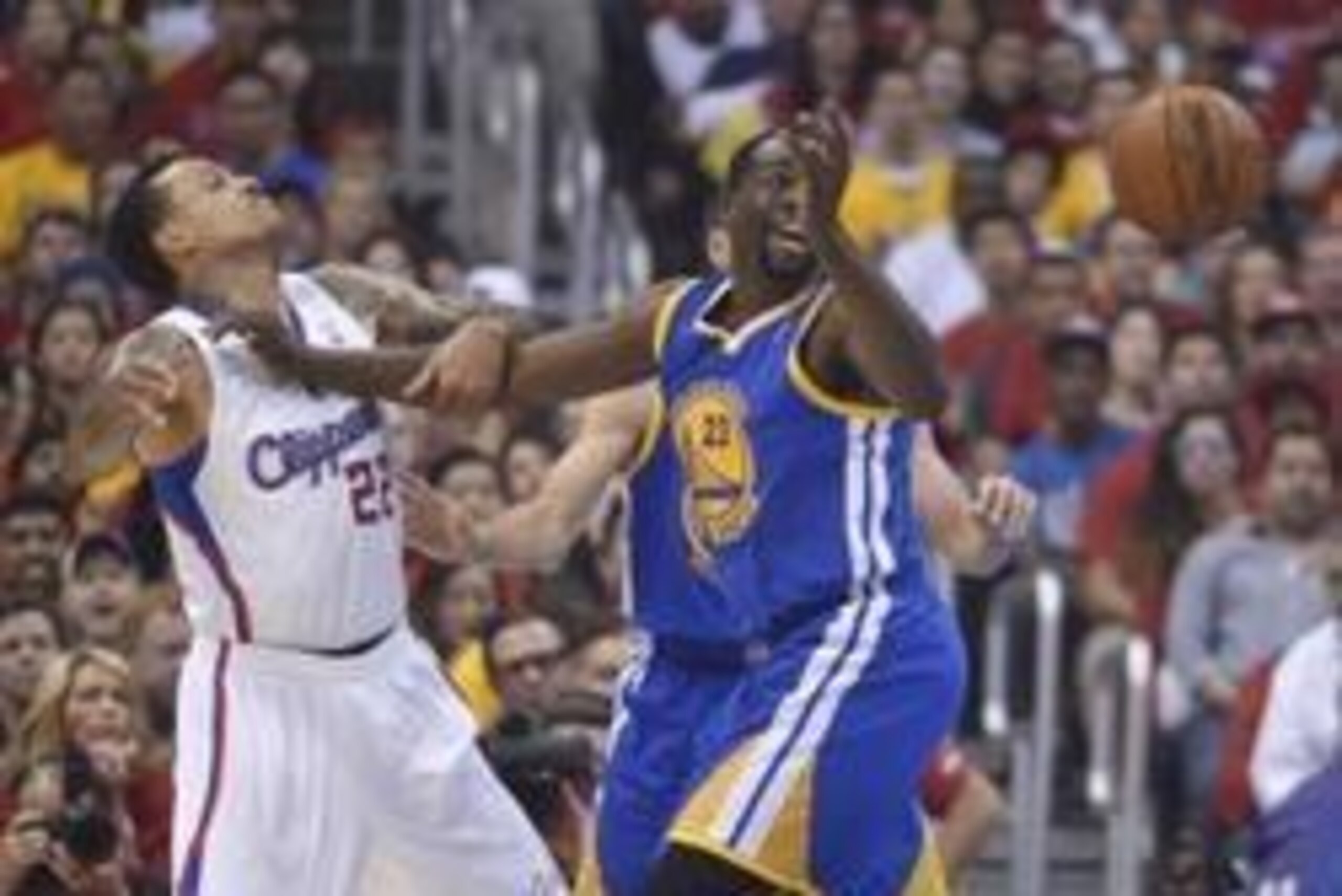 May 3, 2014; Los Angeles, CA, USA; Los Angeles Clippers forward Matt Barnes (22) and Golden State Warriors forward Draymond Green (23) battle for the ball in game seven of the first round of the 2014 NBA Playoffs at Staples Center. Mandatory Credit: Kirby