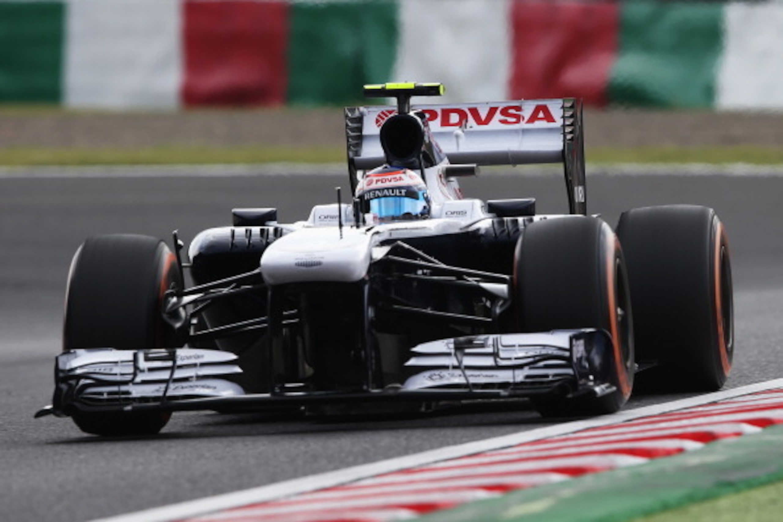SUZUKA, JAPAN - OCTOBER 12:  Valtteri Bottas of Finland and Williams drives during the final practice session prior to qualifying for the Japanese Formula One Grand Prix at Suzuka Circuit on October 12, 2013 in Suzuka, Japan.  (Photo by Mark Thompson/Gett
