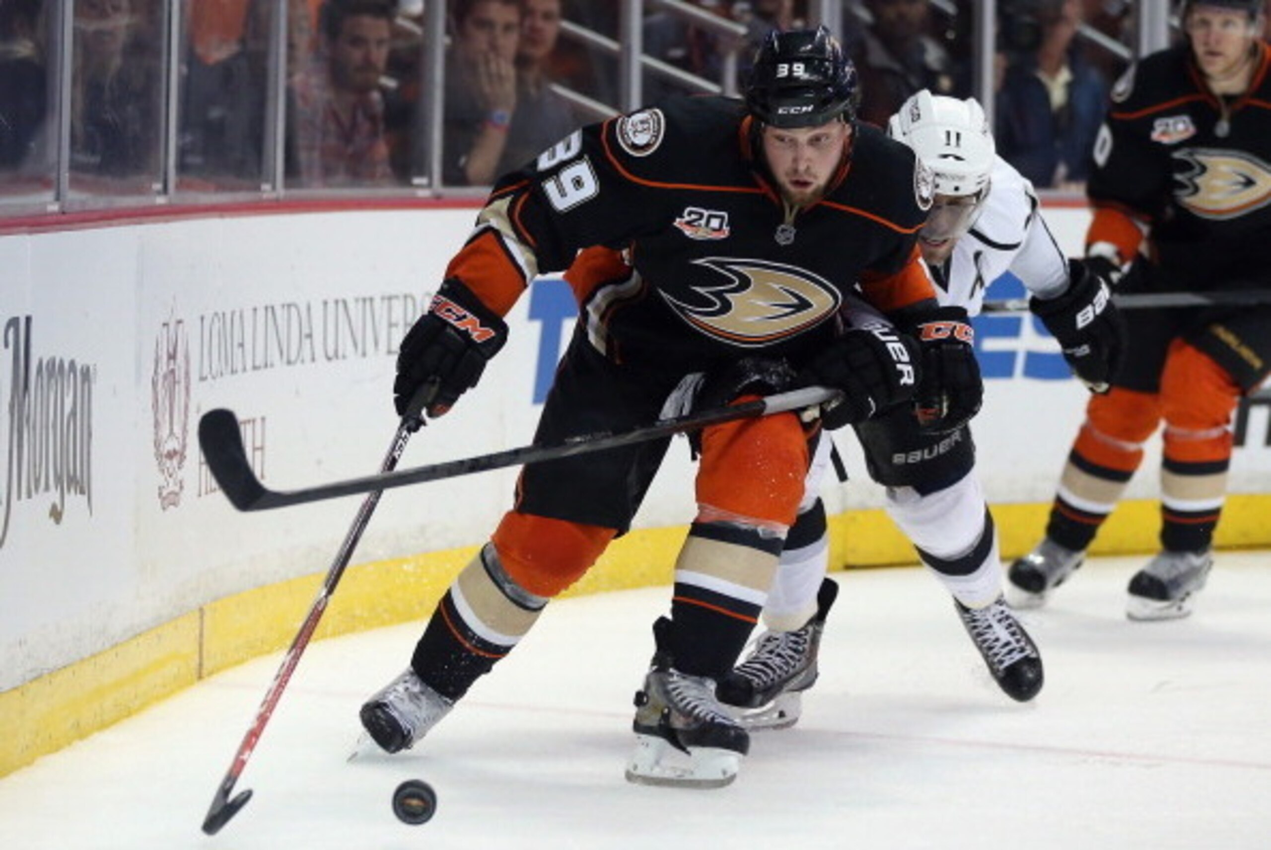 ANAHEIM, CA - MAY 03:  Matt Beleskey #39 of the Anaheim Ducks is challenged by Anze Kopitar #11 of the Los Angeles Kings for the puck in the third period of Game One of the Second Round of the 2014 NHL Stanley Cup Playoffs at Honda Center on May 3, 2014 i