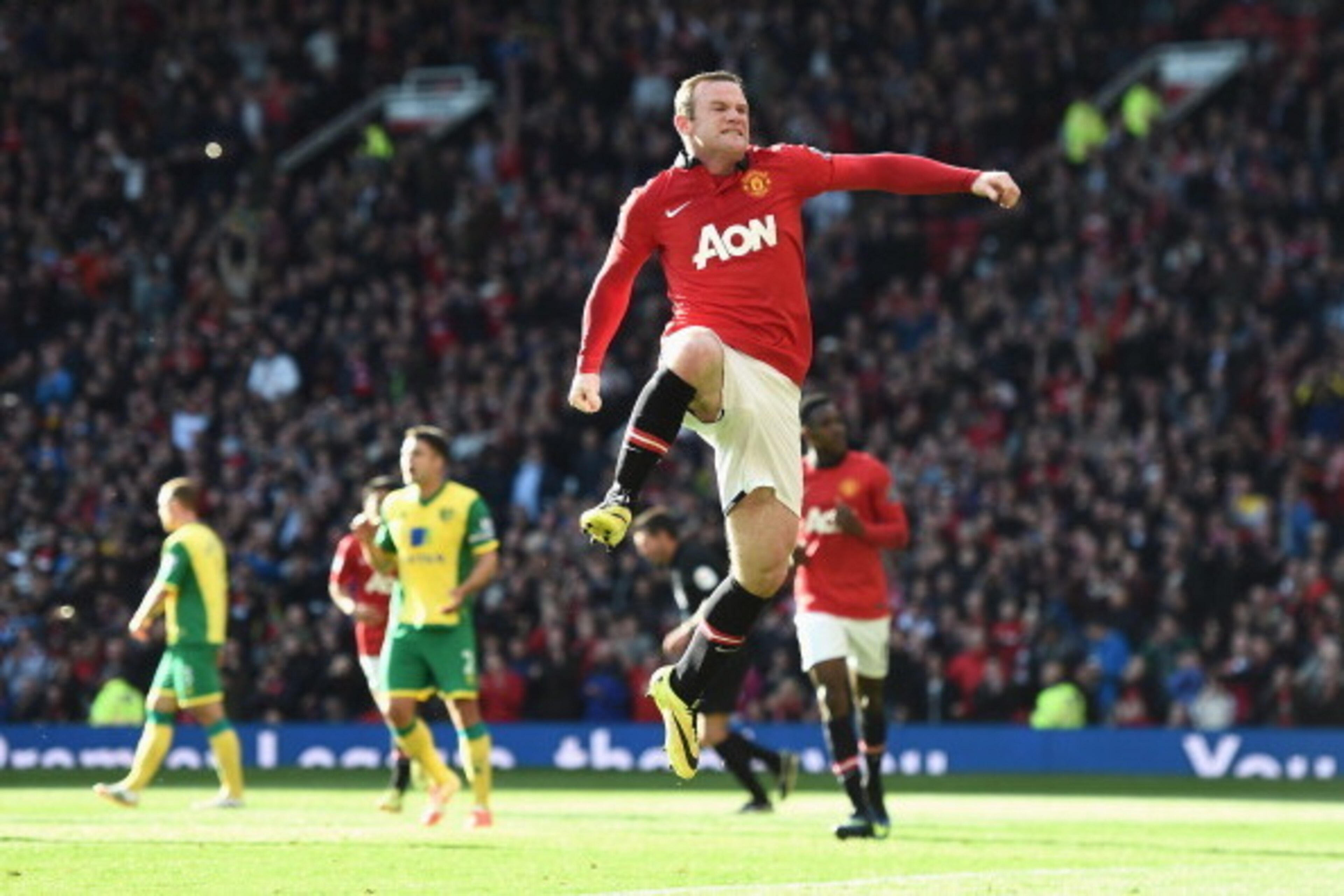 MANCHESTER, ENGLAND - APRIL 26: Wayne Rooney of Manchester United celebrates his first half penalty during the Barclays Premier League match between Manchester United and Norwich City at Old Trafford on April 26, 2014 in Manchester, England.  (Photo by La