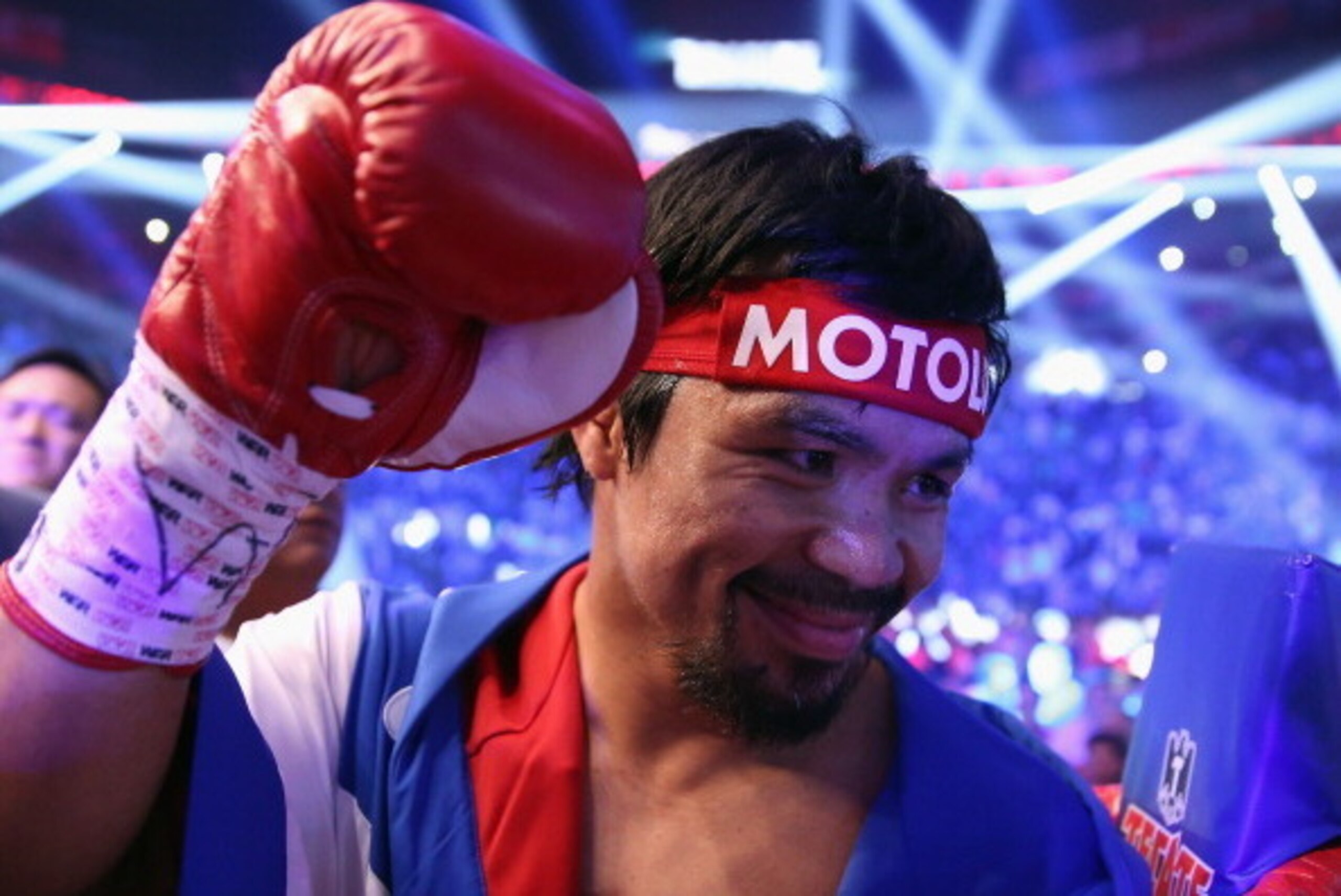 LAS VEGAS, NV - APRIL 12:  Manny Pacquiao acknowledges people in the crowd prior to fighting Timothy Bradley at the MGM Grand Garden Arena on April 12, 2014 in Las Vegas, Nevada.  (Photo by Jeff Gross/Getty Images)