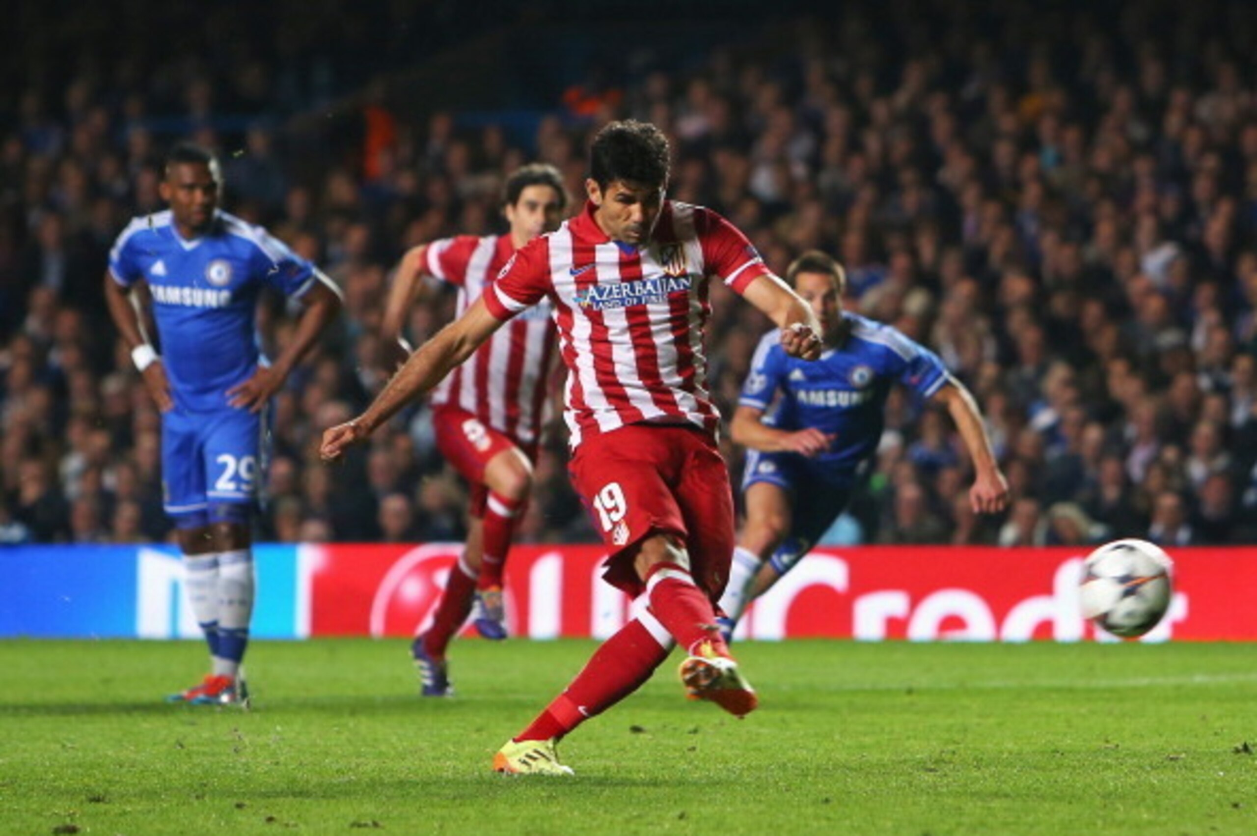 LONDON, ENGLAND - APRIL 30: Diego Costa of Club Atletico de Madrid scores from the penalty spot during the UEFA Champions League semi-final second leg match between Chelsea and Club Atletico de Madrid at Stamford Bridge on April 30, 2014 in London, Englan
