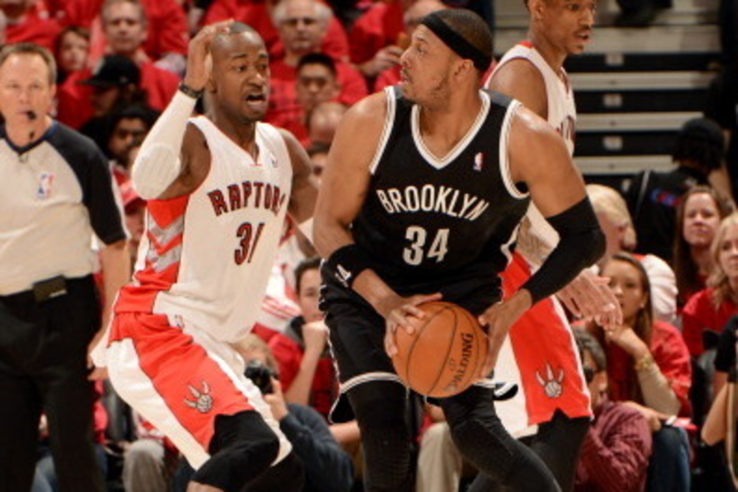 TORONTO, ON - MAY 4: Paul Pierce #34 of the Brooklyn Nets  handles the ball against Terrence Ross #31 of the Toronto Raptors in Game Seven of the Eastern Conference Quarterfinals during the NBA Playoffs at the Air Canada Centre on May 4, 2014 in Toronto, 